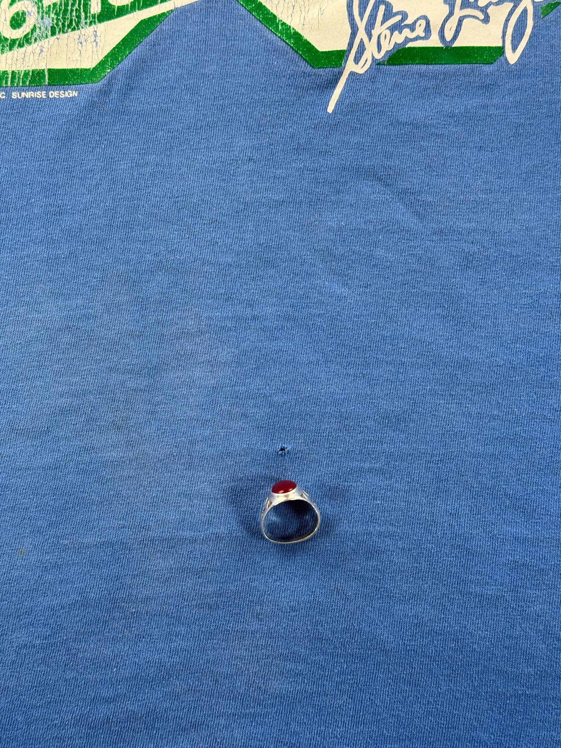 Small pinhole on the front of Vintage 1989 Seahawks Steve Largent End of An Era Tee SZ M (Fits S)