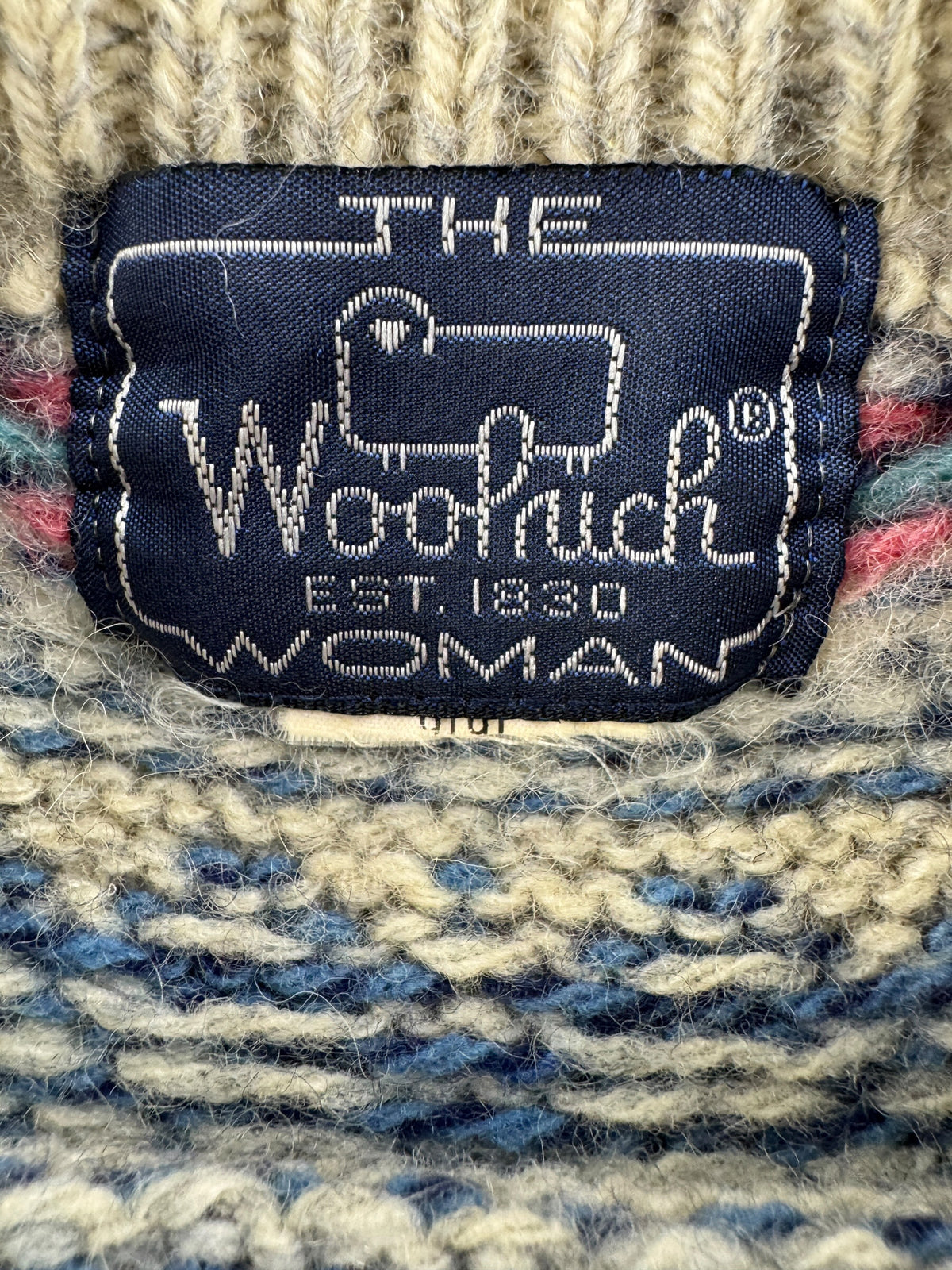 Tag close-up on Vintage 1980s Woolrich Woman's Norwegian-style Sweater SZ L