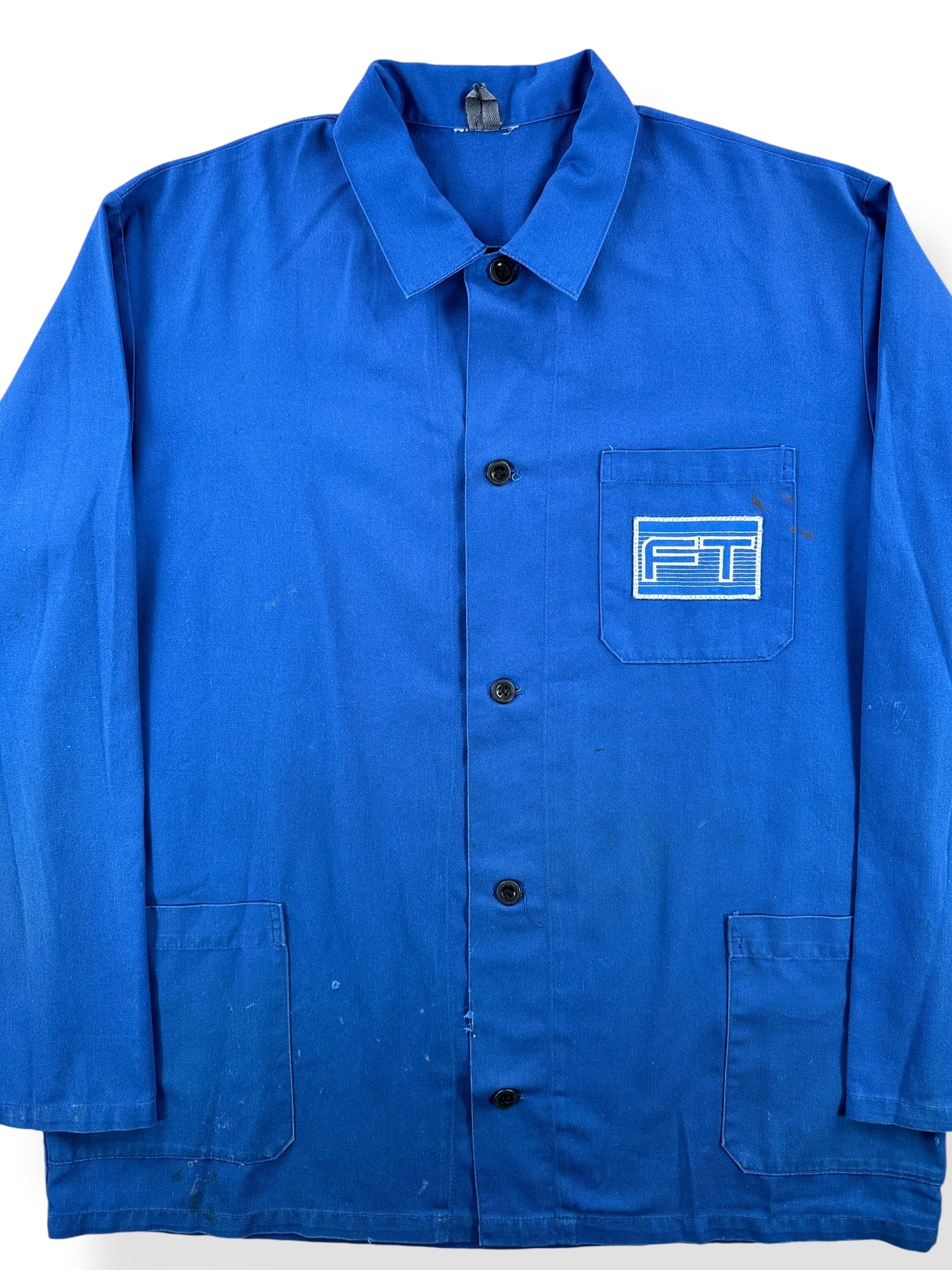 Front Close Up of Vintage French Chore Coat w/ FT Patch SZ XL