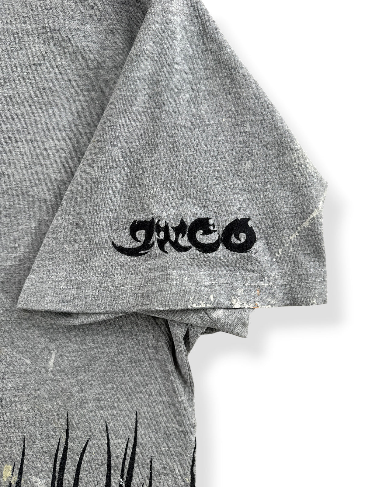 Sleeve graphic on Vintage JNCO Skull Tee SZ L