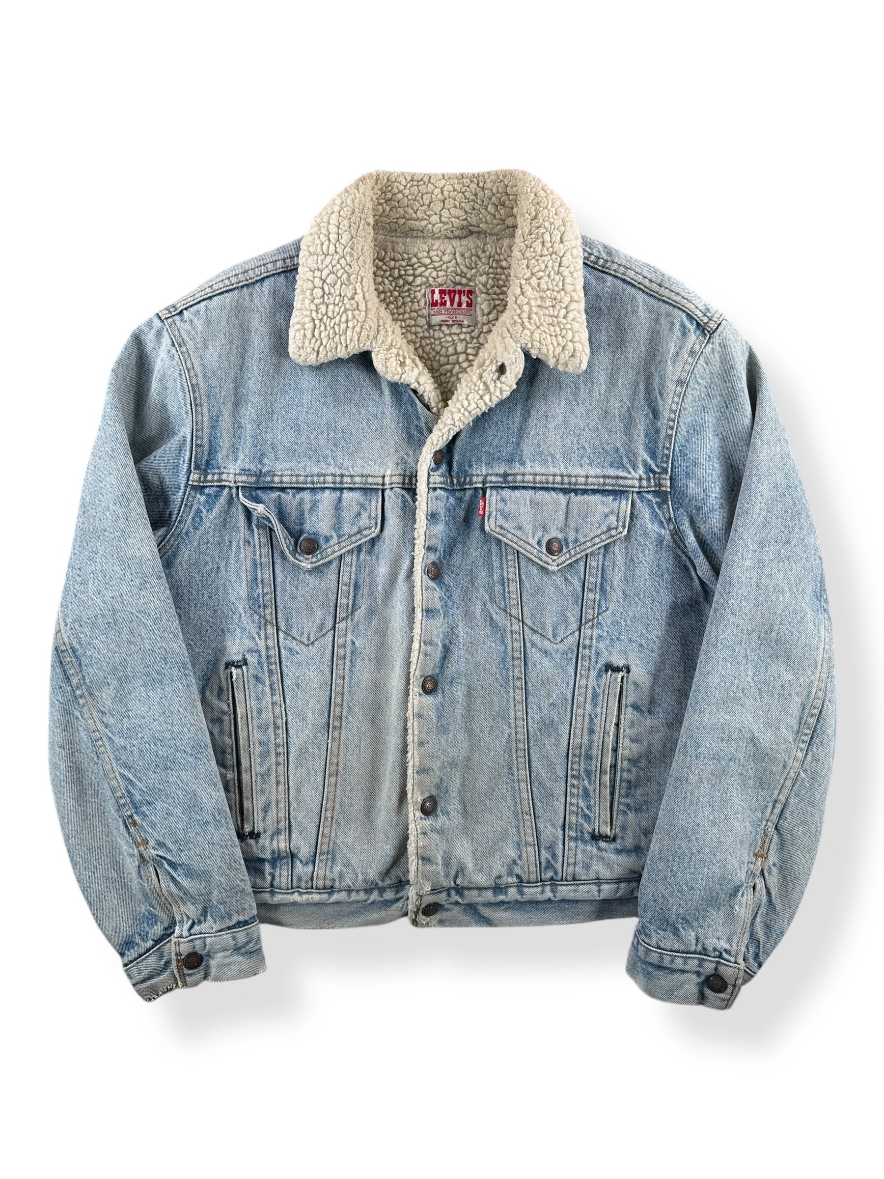 Front of Vintage Light Wash Levis Shearling Denim Trucker Jacket SZ 42