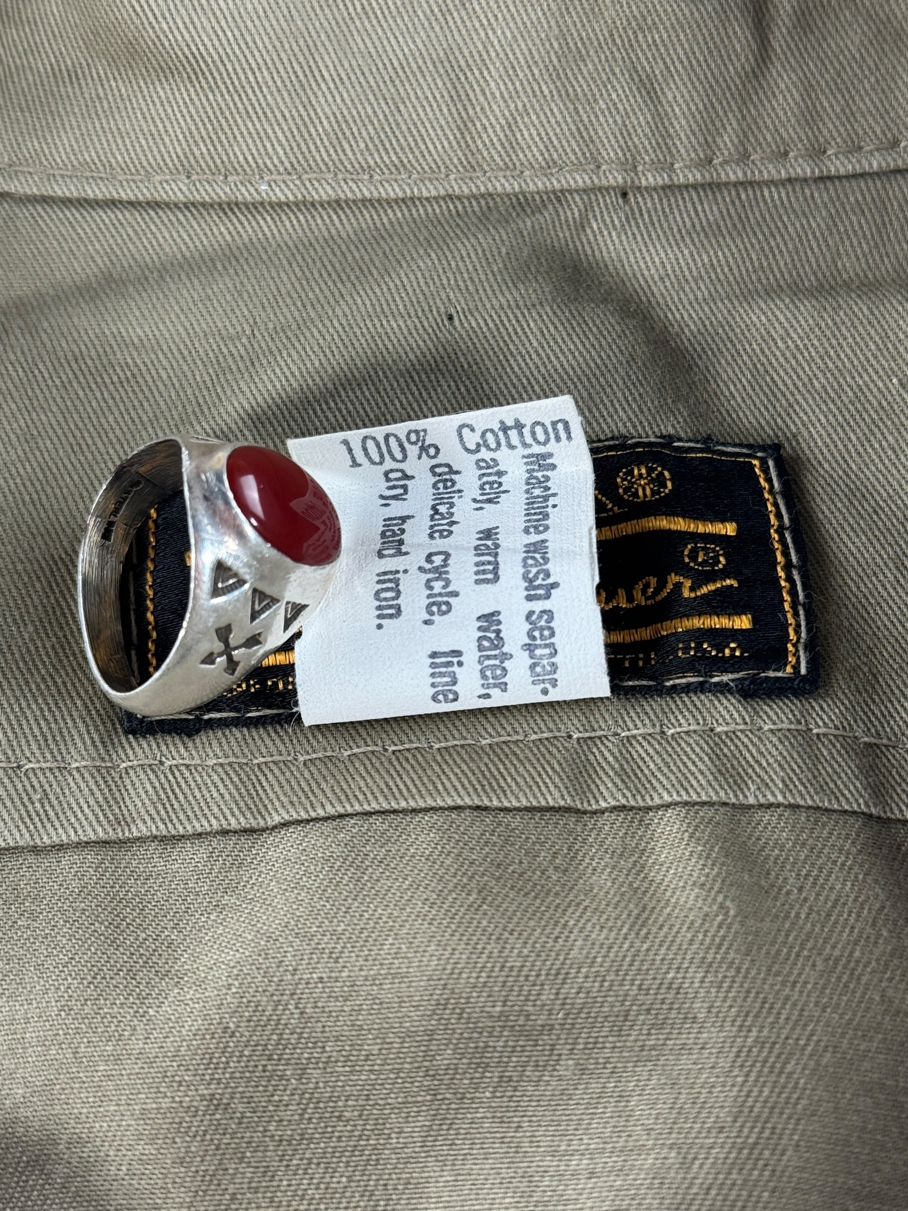 Back of tag on Vintage Filson Eddie Bauer Woodland Park Zoo Safari Shirt SZ S