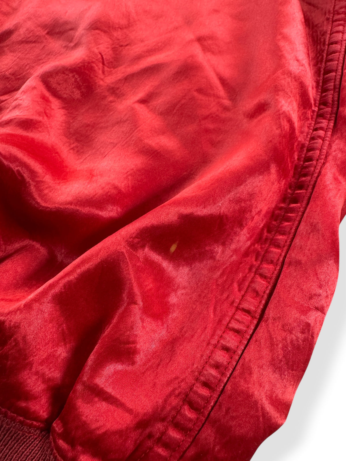 Small bleach stain on side of Vintage Southland Satin Basketball Jacket SZ L