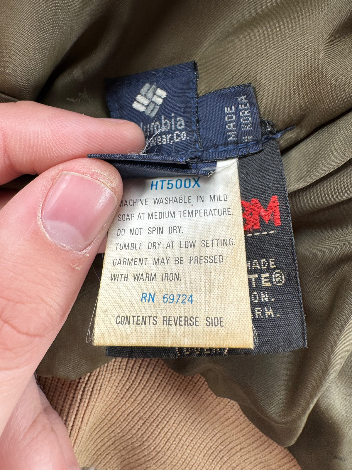 Tags on inner pocket of Vintage Columbia Reversible Hunting Bomber Jacket SZ L