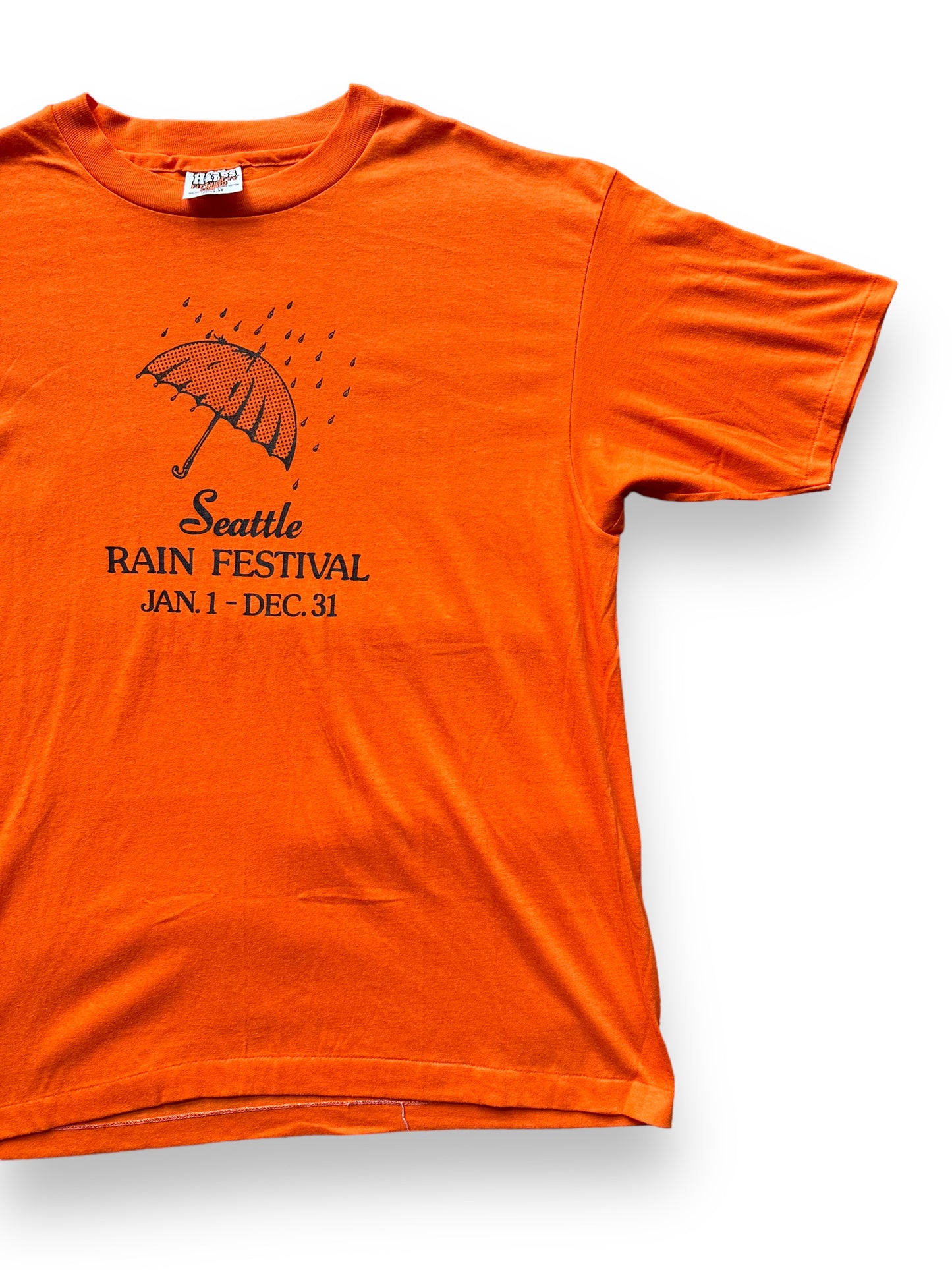 Front Left View of Vintage Orange Seattle Rain Festival Tee SZ XL | Vintage Seattle Tourist Tees | Barn Owl Vintage Tees Seattle