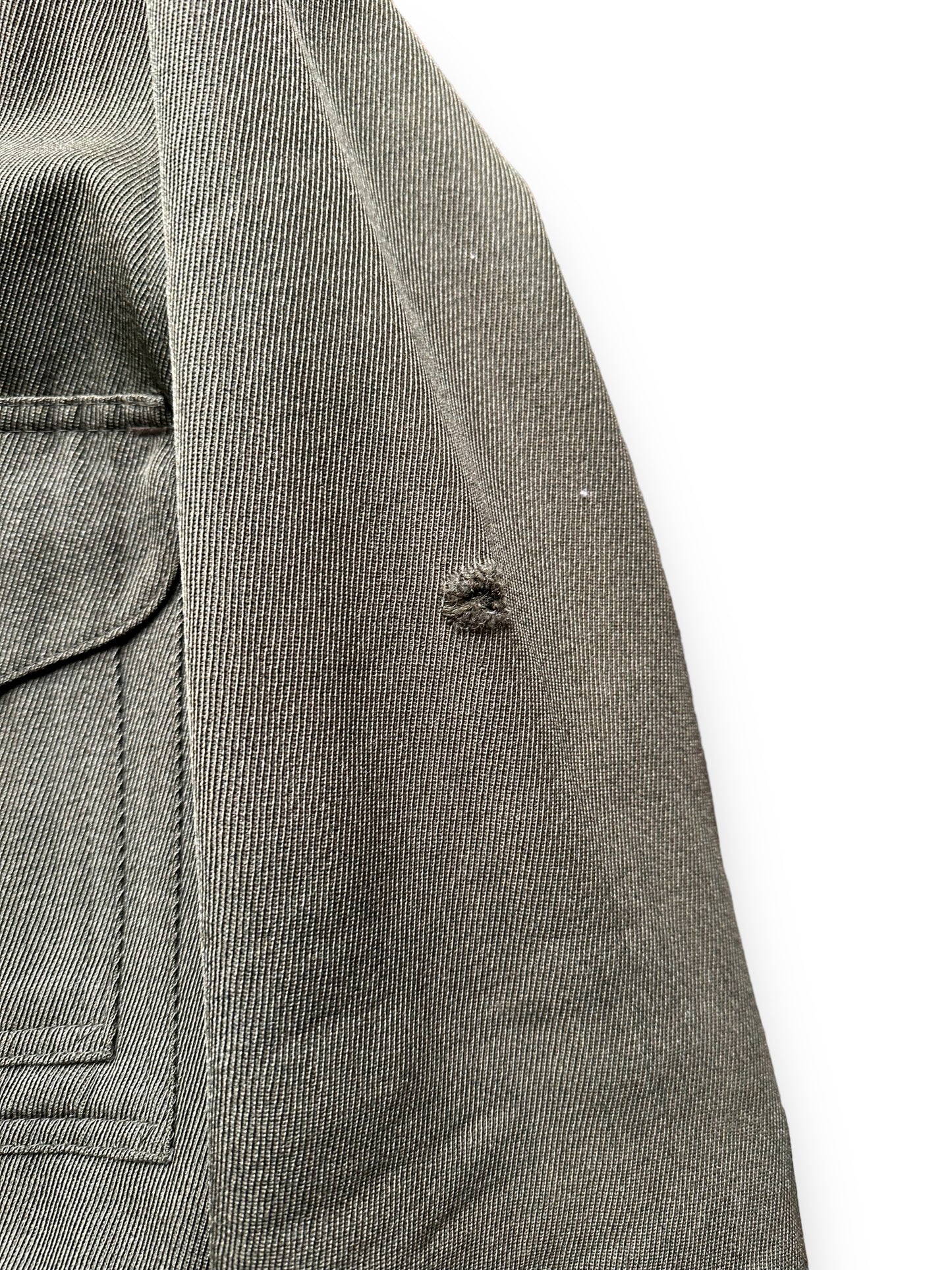 Small Hole in Left Arm of Vintage Filson Whipcord Cruiser SZ XL | Vintage Workwear Seattle | Vintage Filson Seattle