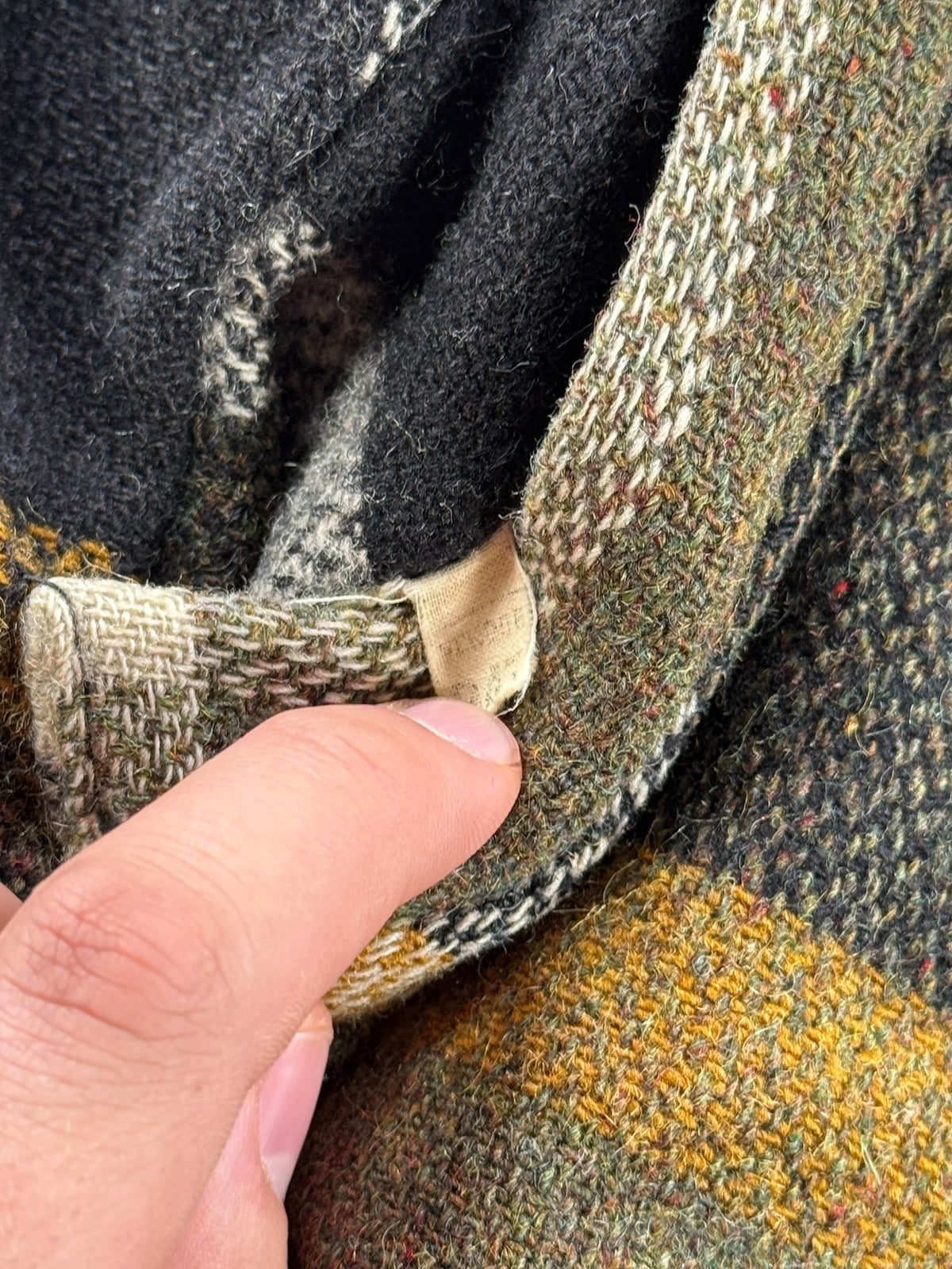 Tag on pocket of Vintage 60s/70s Fleece Lined Wool Jacket SZ L