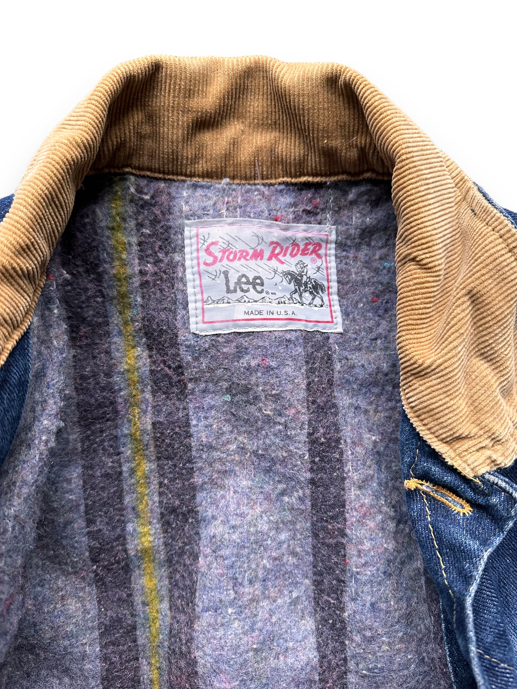 Tag View of Vintage 80s Era Lee Storm Rider SZ L | Vintage Denim Workwear Seattle | Barn Owl Vintage Seattle