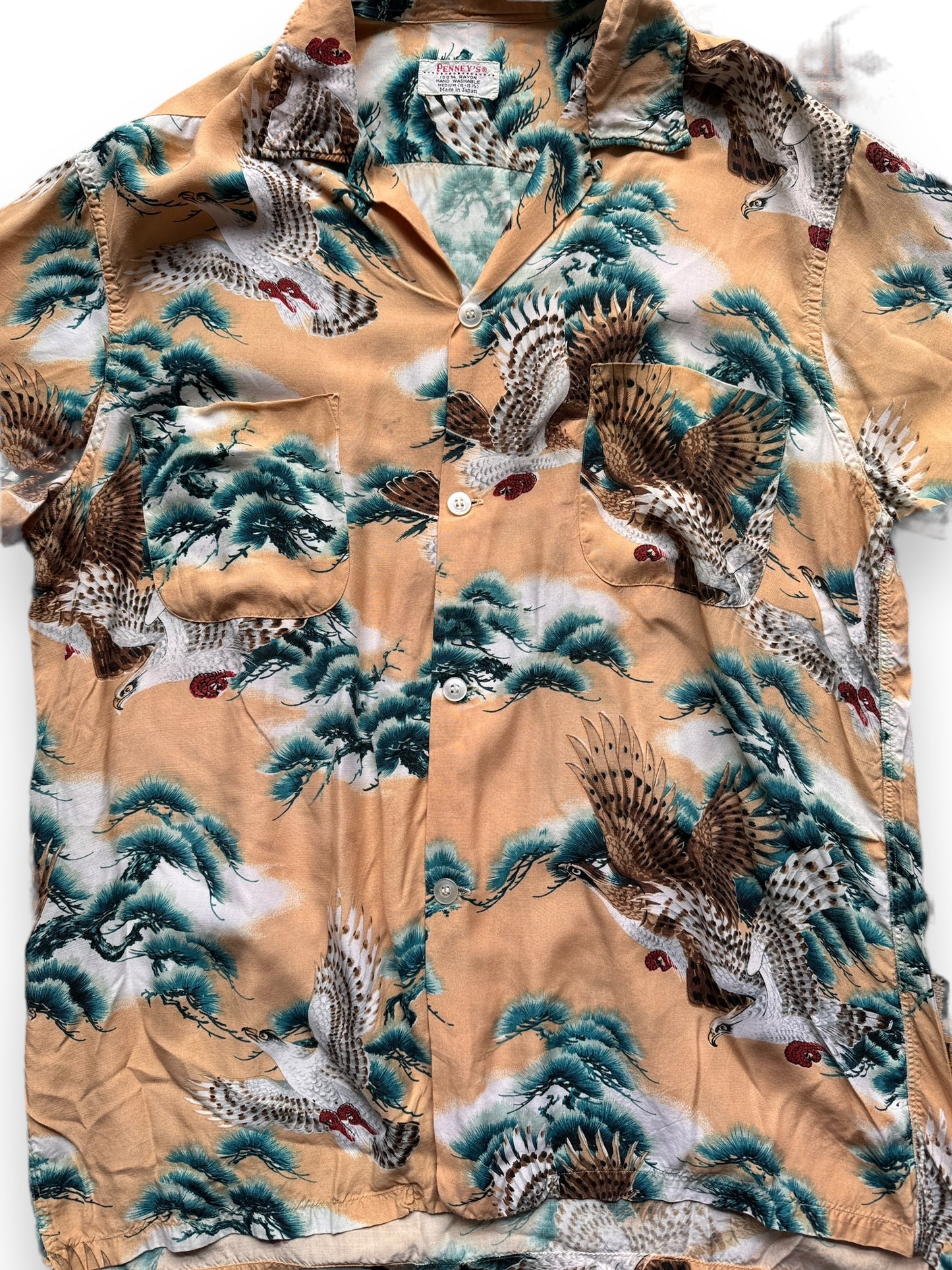 front close up of Vintage Made in Japan Eagle Motif Penney's Aloha Shirt SZ M