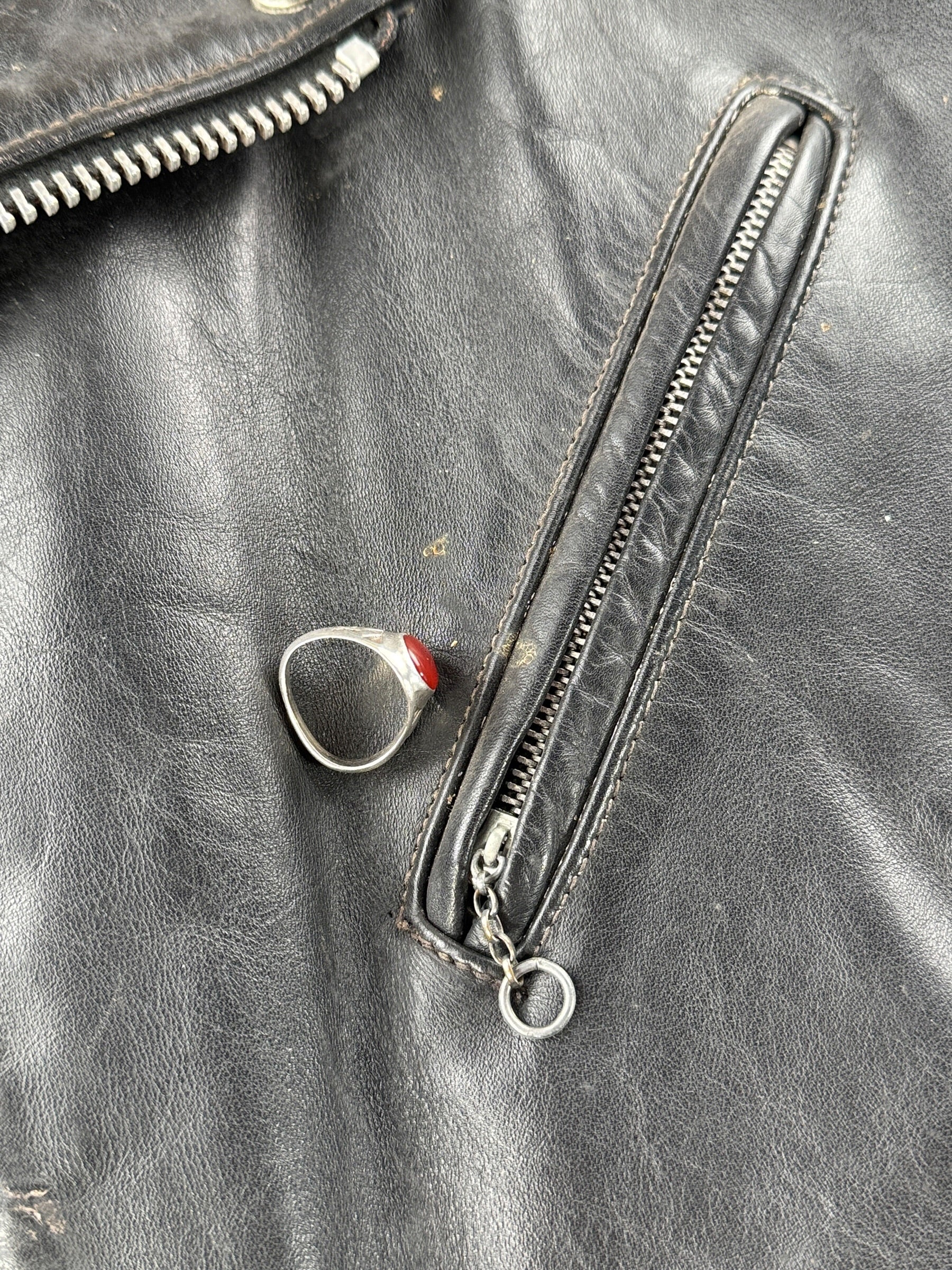 Gunk on pocket of Vintage 80s Era Schott Perfecto Leather Jacket SZ 44