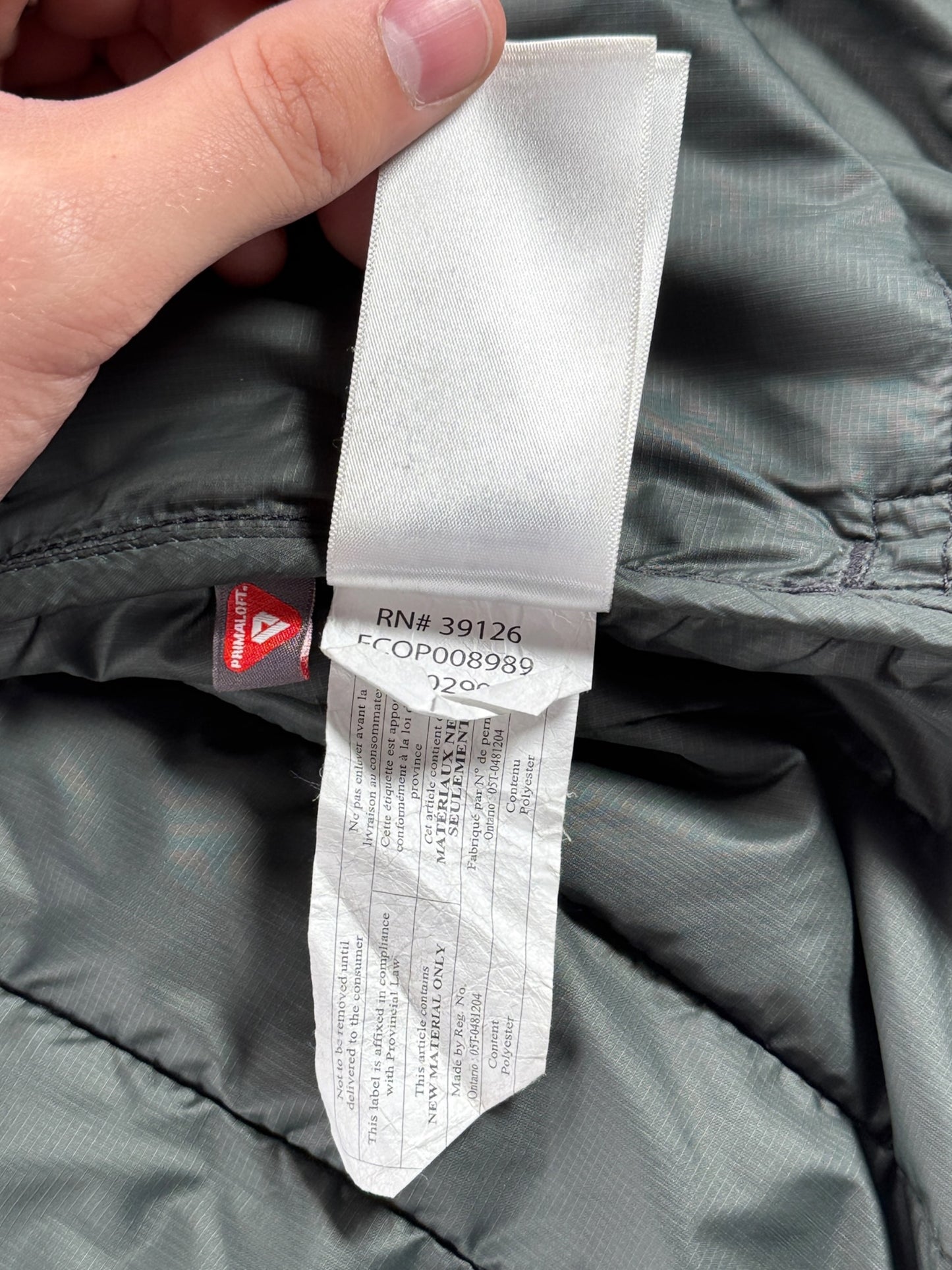 Inner tags on Filson Quilted Vest SZ M