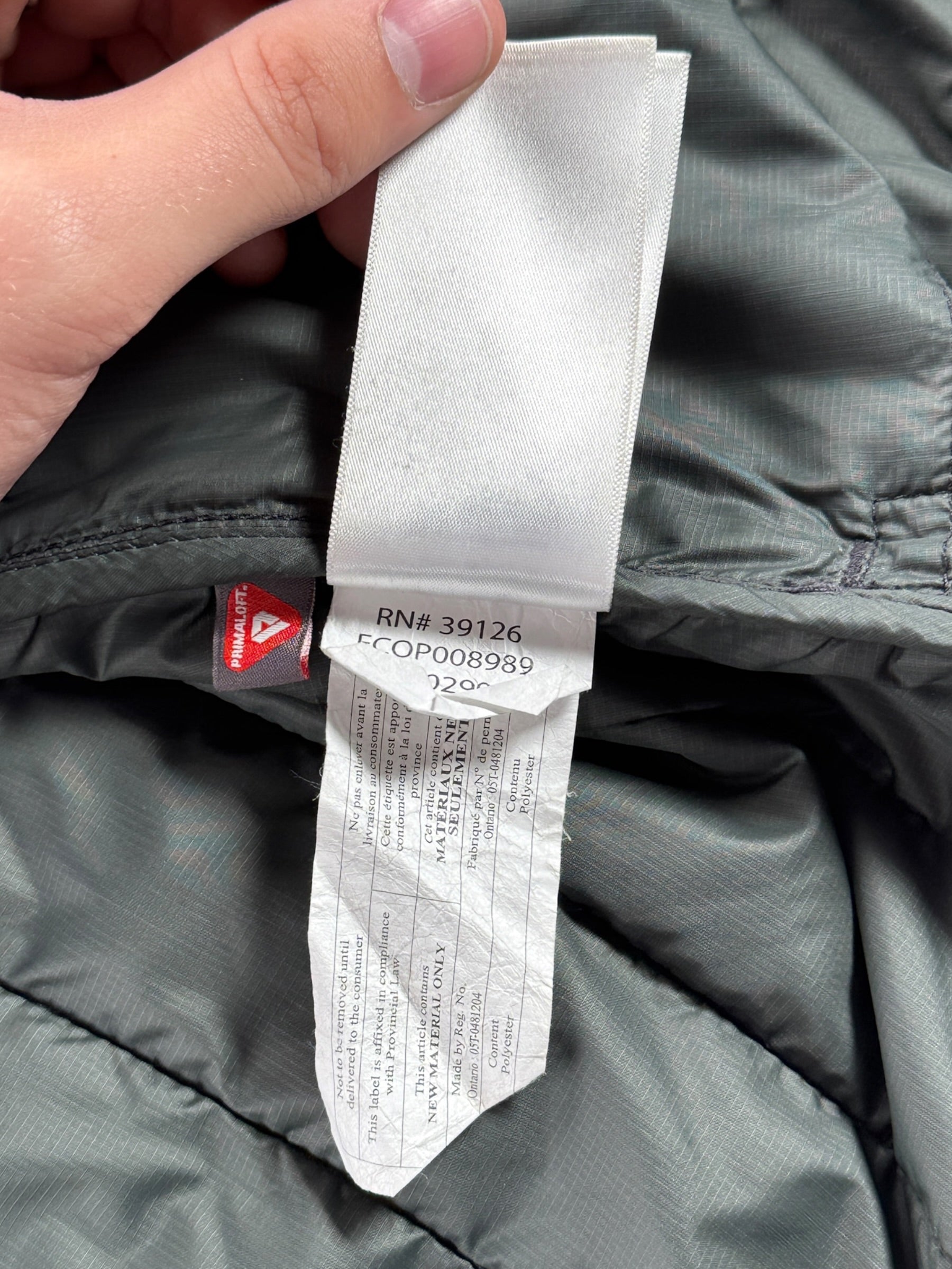 Inner tags on Filson Quilted Vest SZ M