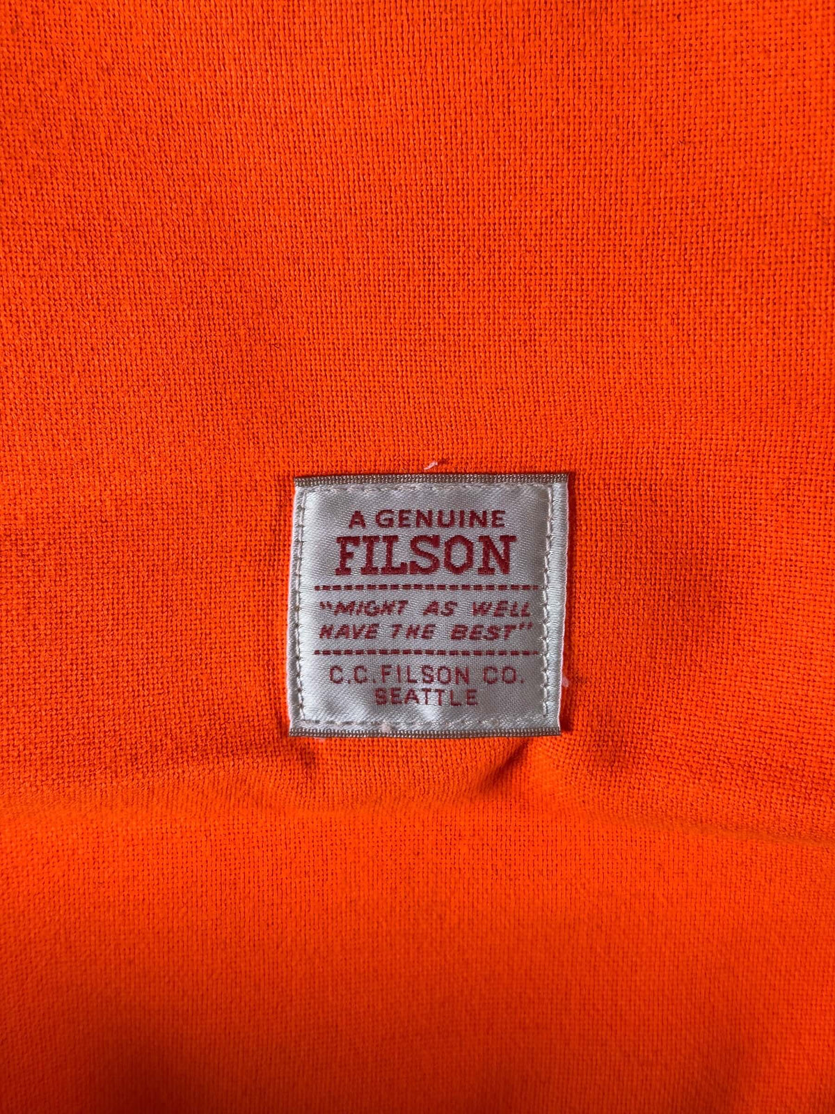 Flison brand tag on inside of Filson Heritage Sportsman Bag Orange Dark Tan NWOT
