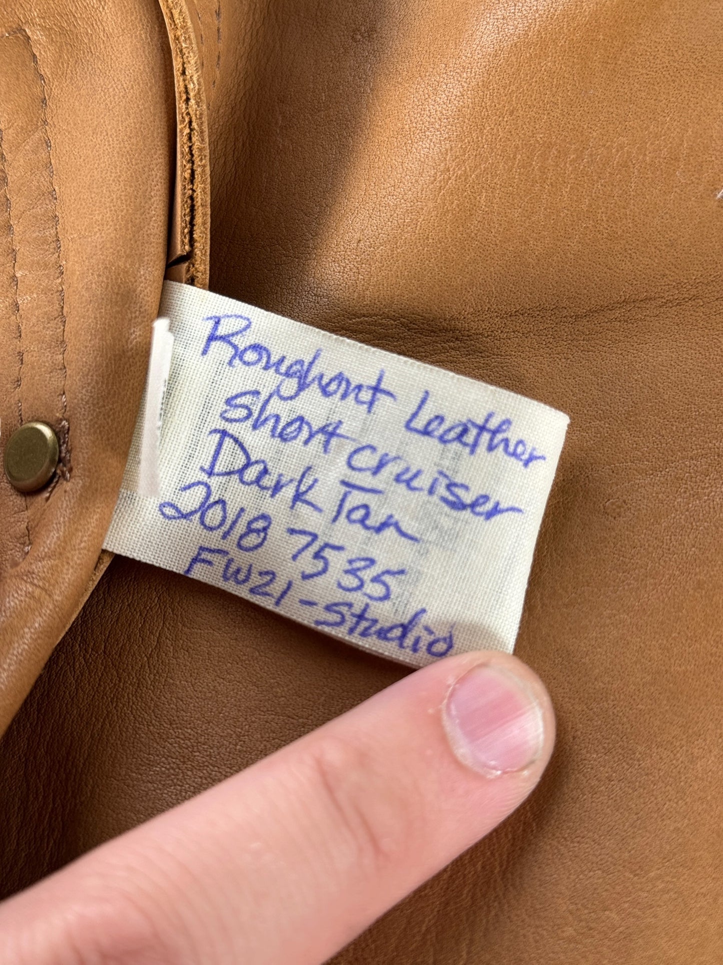 Handwritten description on tag of Filson Dark Tan Roughout Leather Short Cruiser SZ M