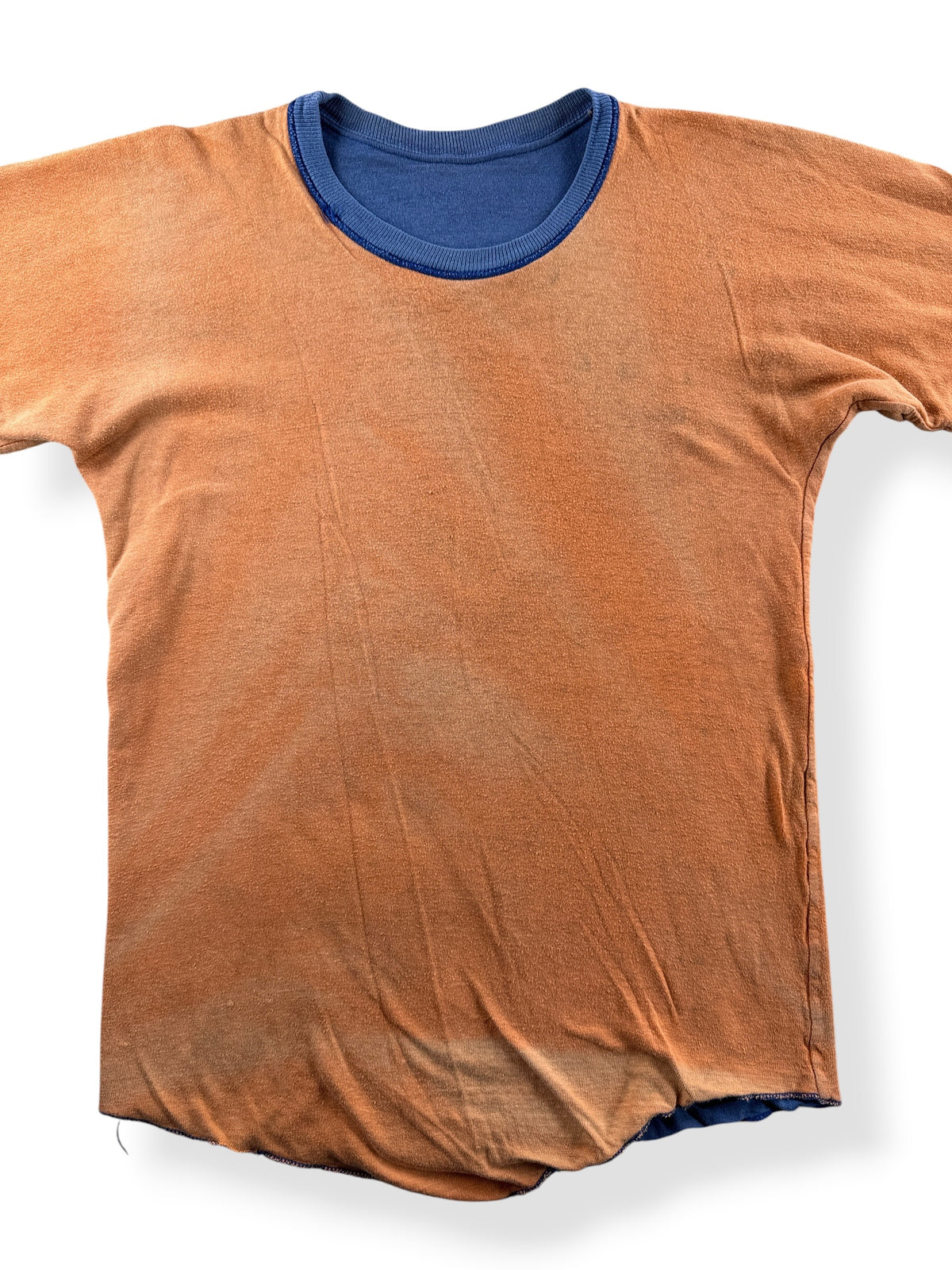Close-up of Vintage Orange / Blue Reversible Tee SZ M