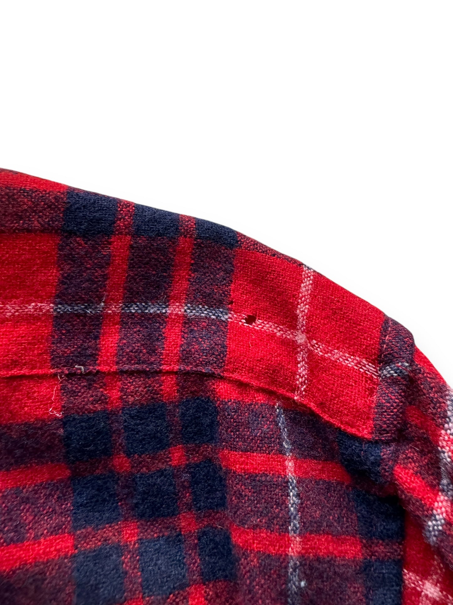 small hole on shoulder of Vintage Pendleton Red/Blue/White Flannel SZ M