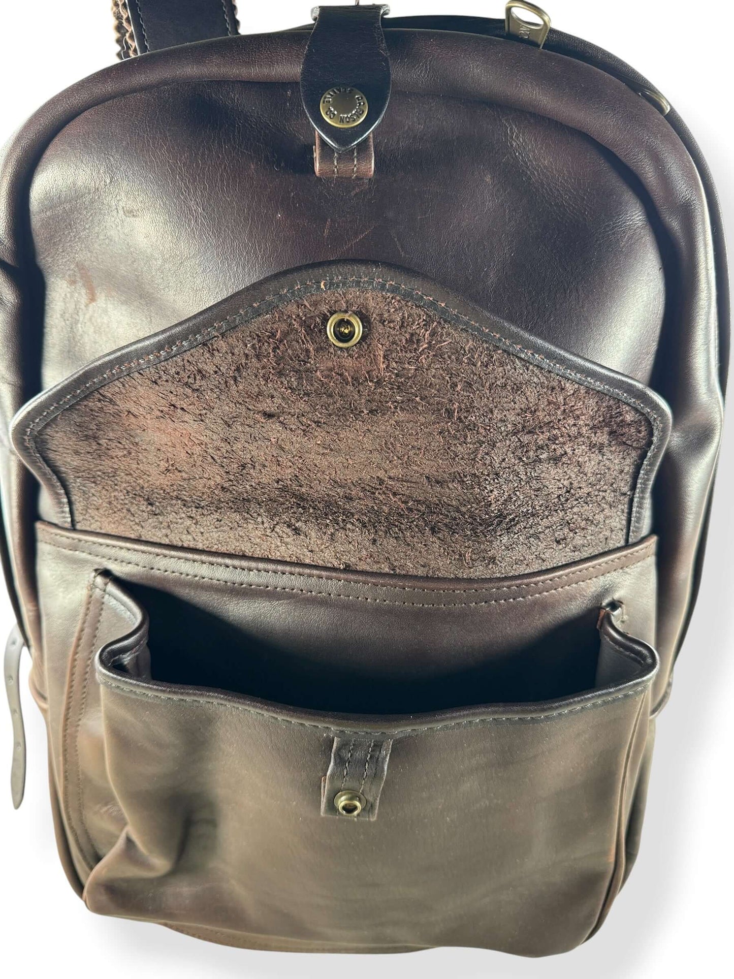 Open front flap on Filson Weatherproof Sierra Brown Leather Journeyman Backpack