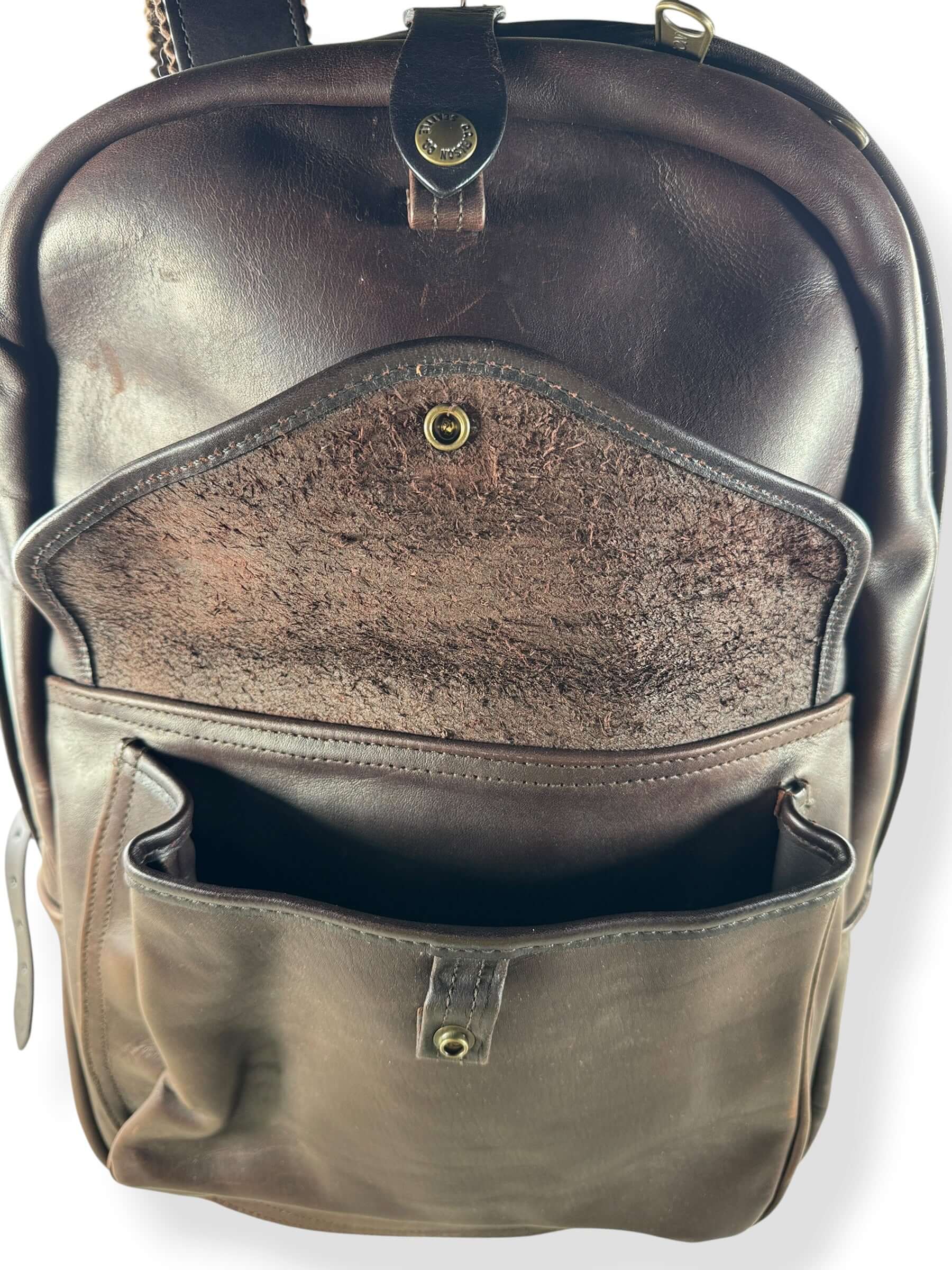 Open front flap on Filson Weatherproof Sierra Brown Leather Journeyman Backpack