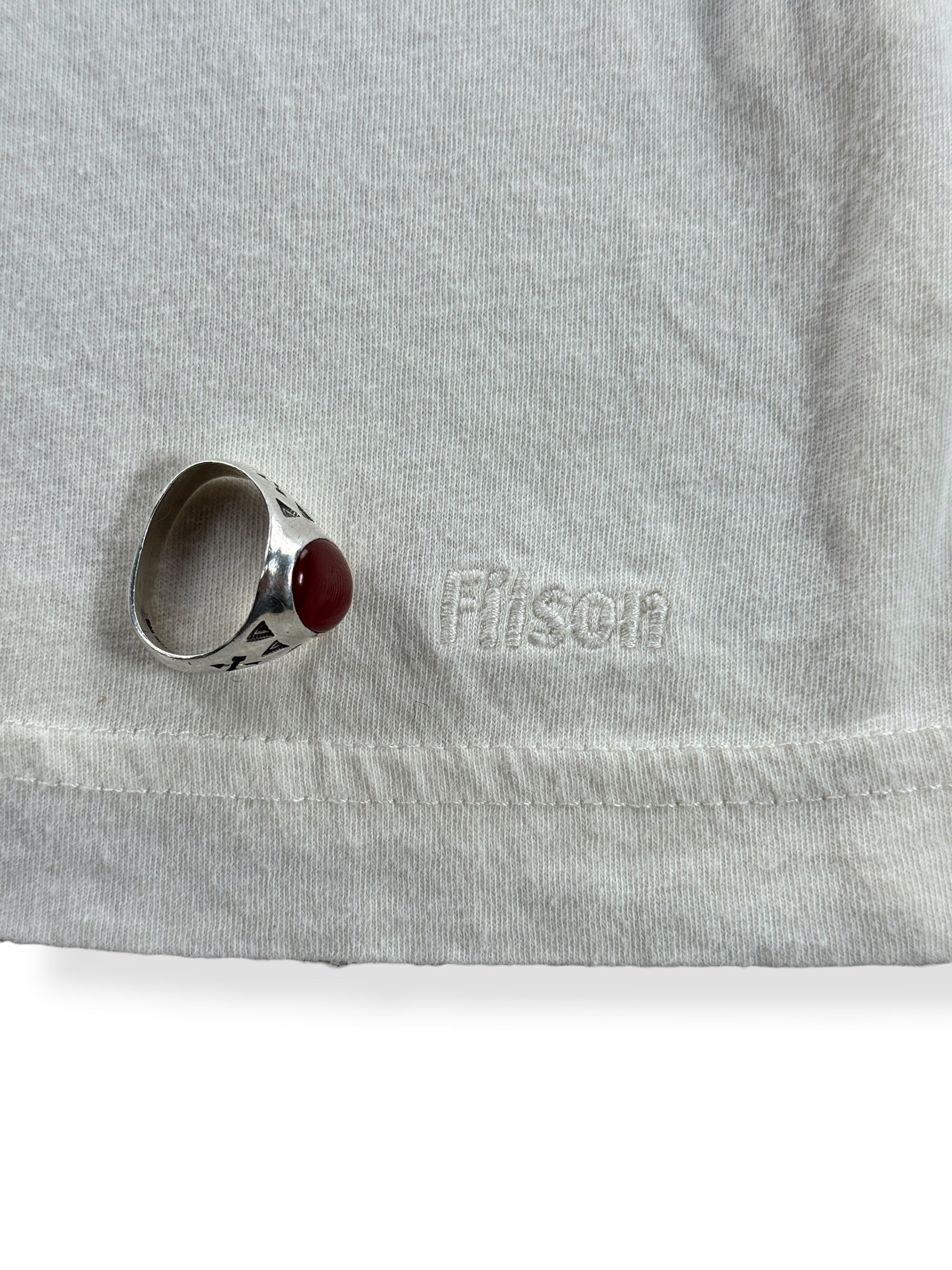 Embroidered filson logo on bottom hem of Filson Popeye Tee SZ S