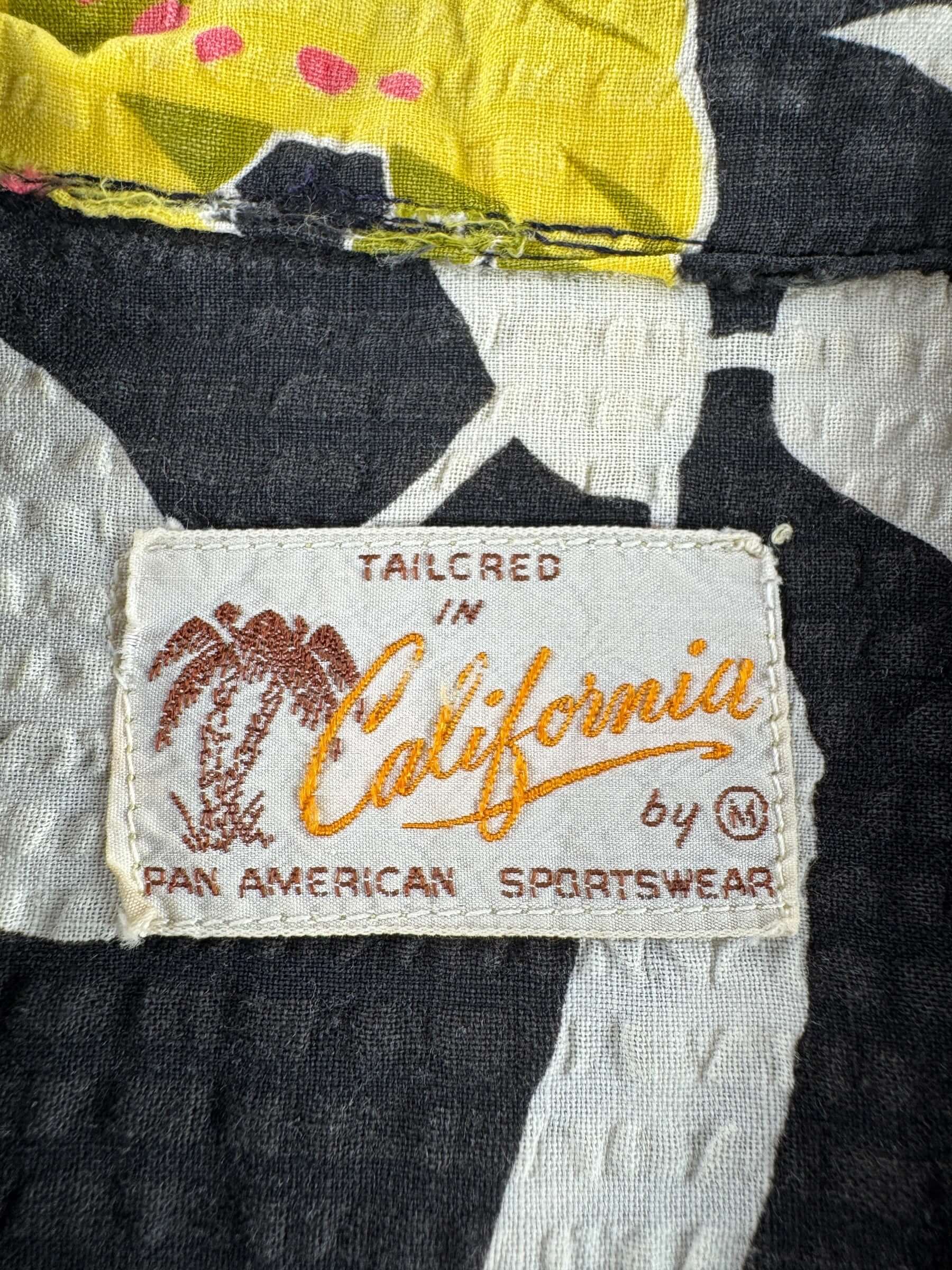 Label on Vintage Pan American Sportswear Black Floral Crepe Aloha Shirt SZ M