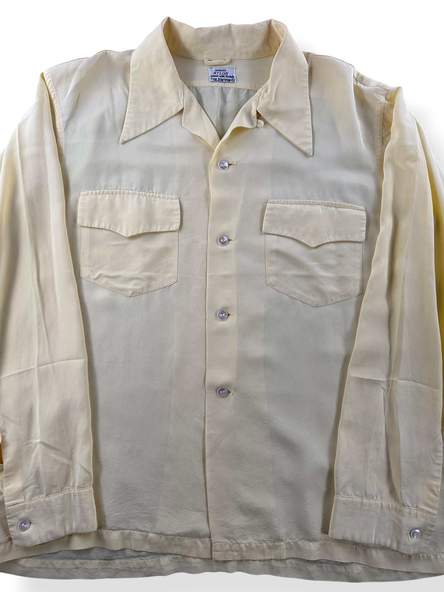 Close-up of Vintage 1960s Nylon Glentop Loop Collar Shirt SZ L