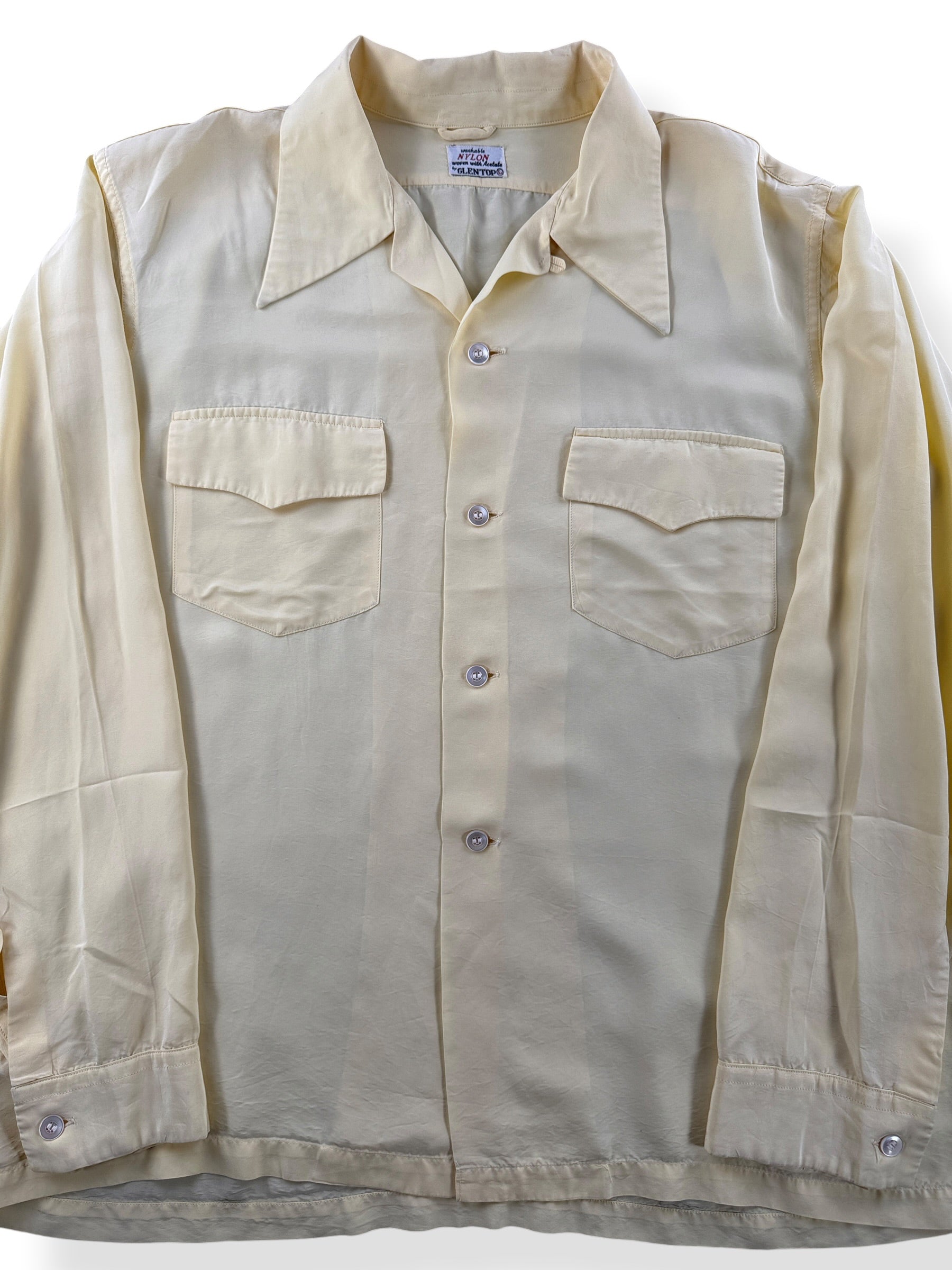Close-up of Vintage 1960s Nylon Glentop Loop Collar Shirt SZ L