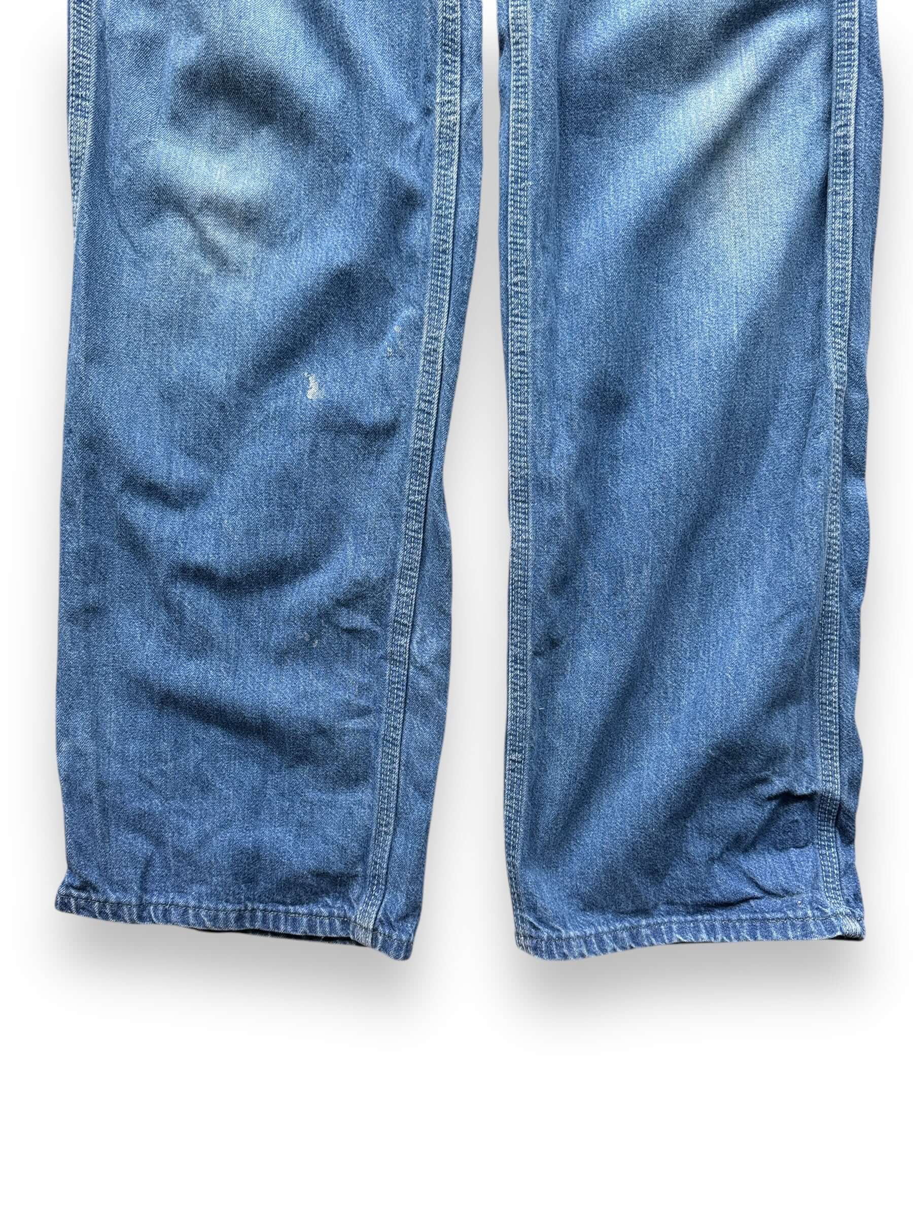 leg closeup on Vintage Lee Denim Overalls W26