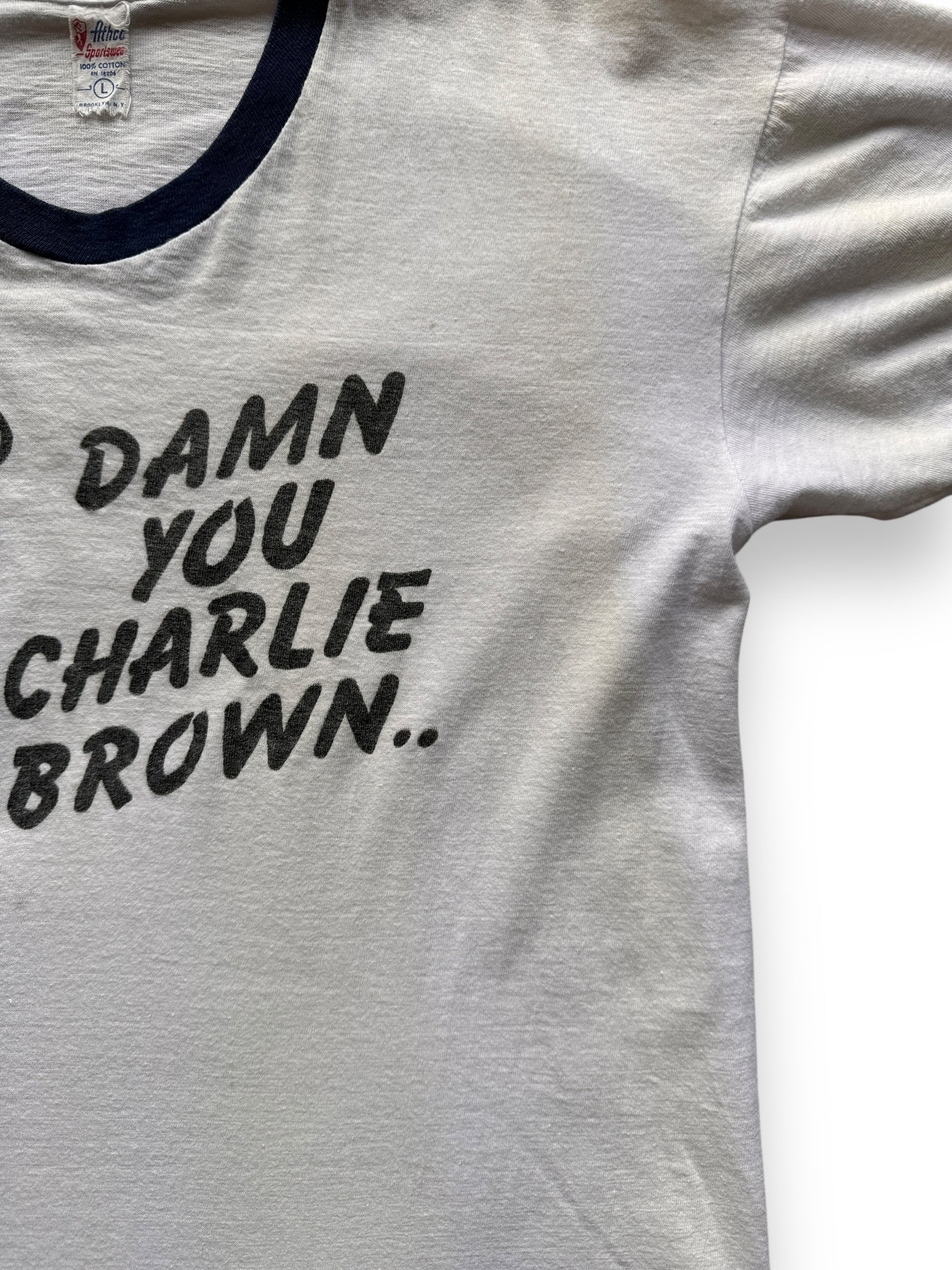 faint discoloring on Vintage Charlie Brown Ringer Tee SZ M