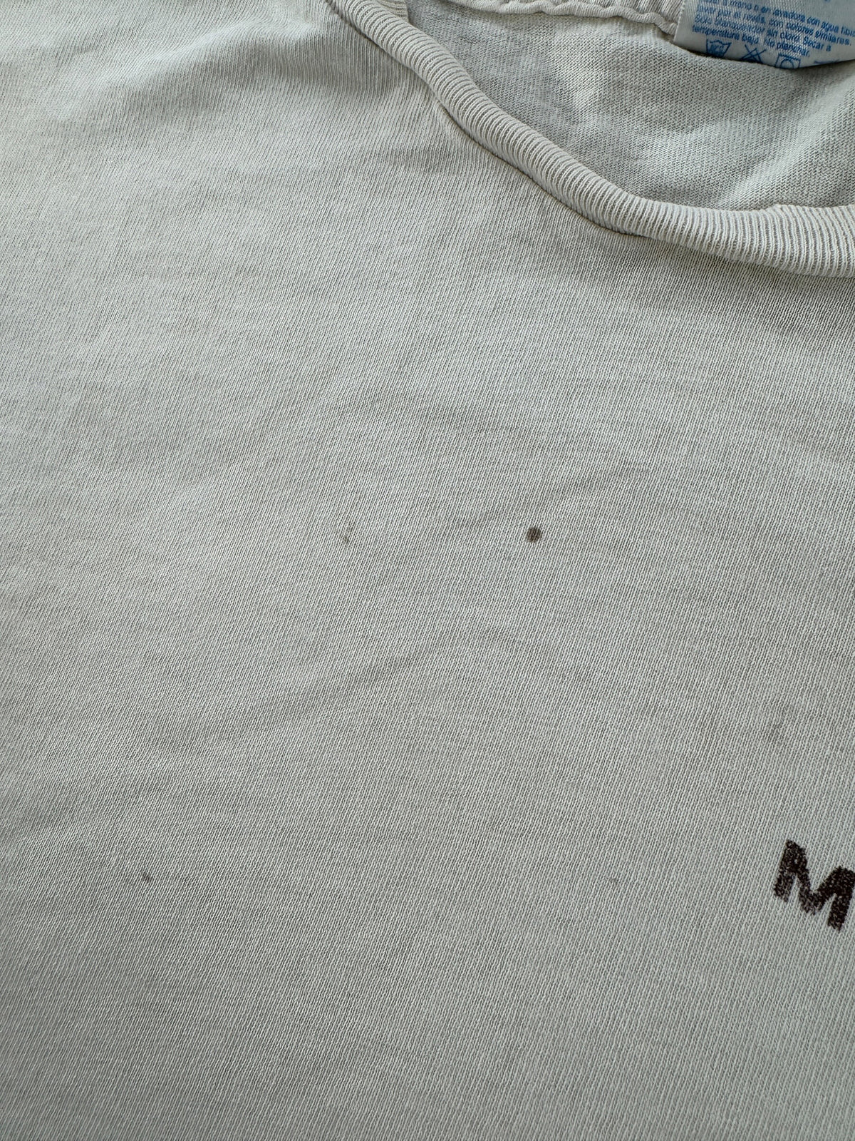 Small stains under collar on Vintage Distressed Myer's Rum Tee SZ L