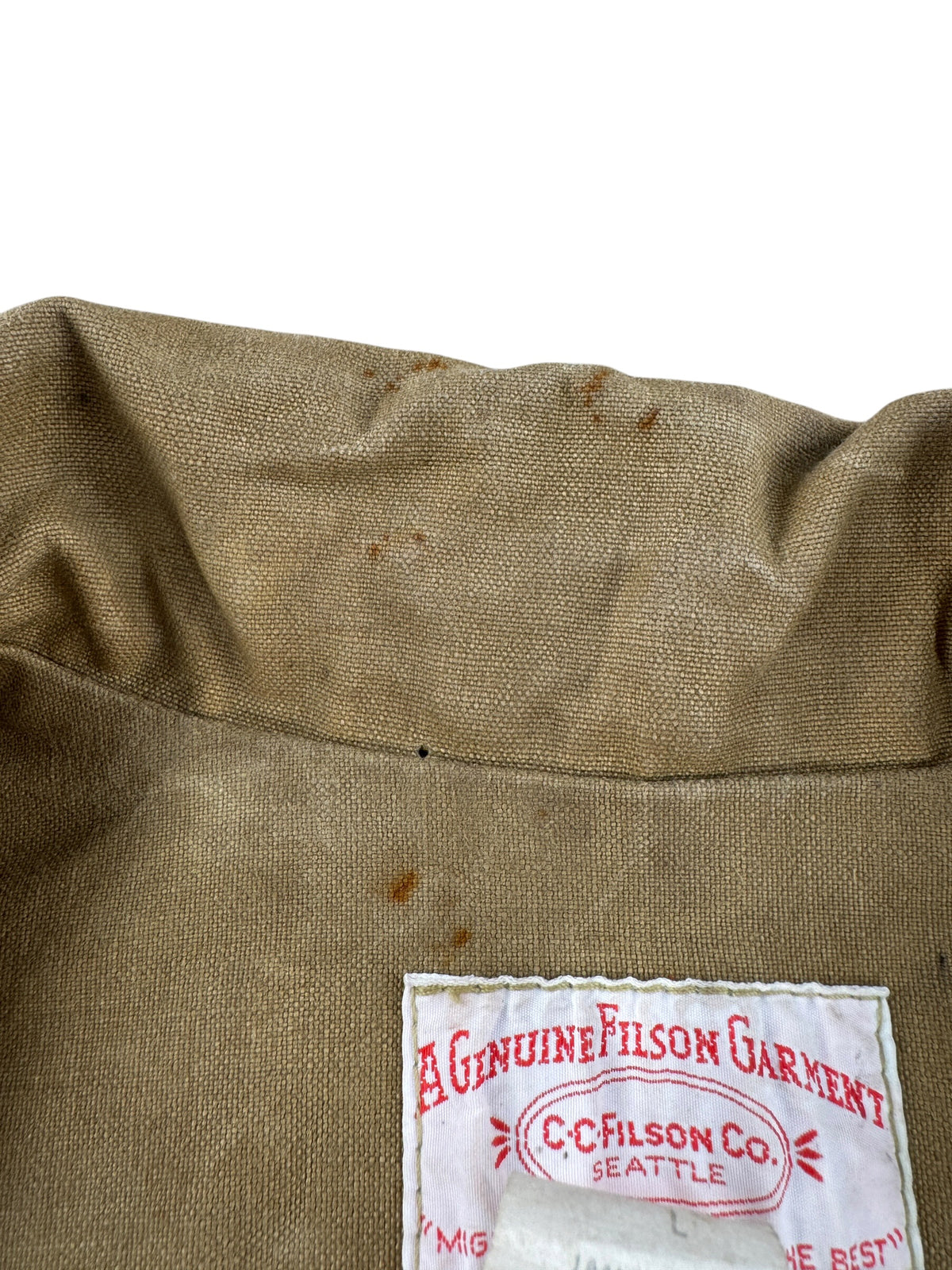 Staining by collar on Vintage Filson Double Tin Jacket SZ L