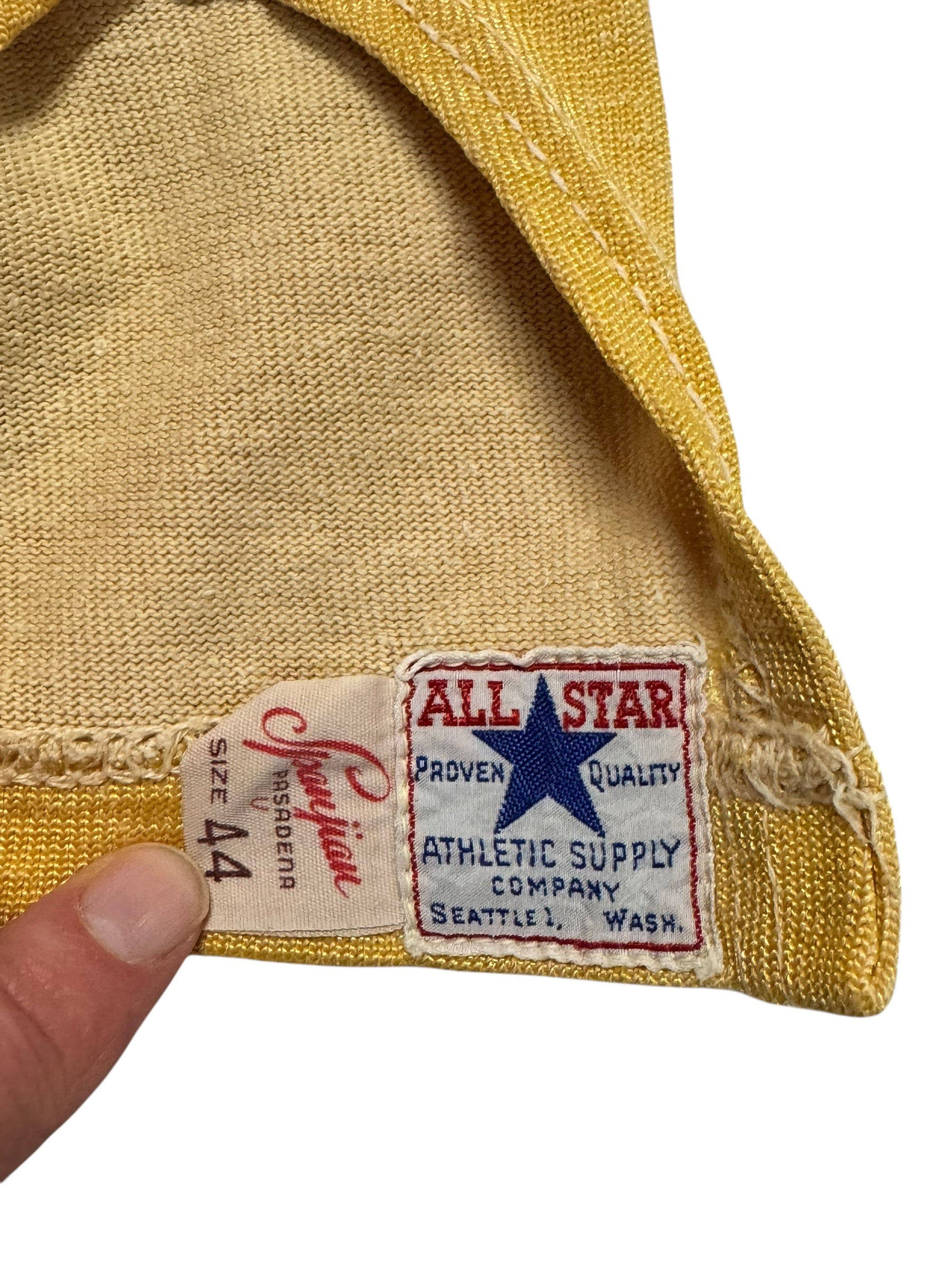 Tag view of 1950s All Star Athletic Supply Durene Jersey L