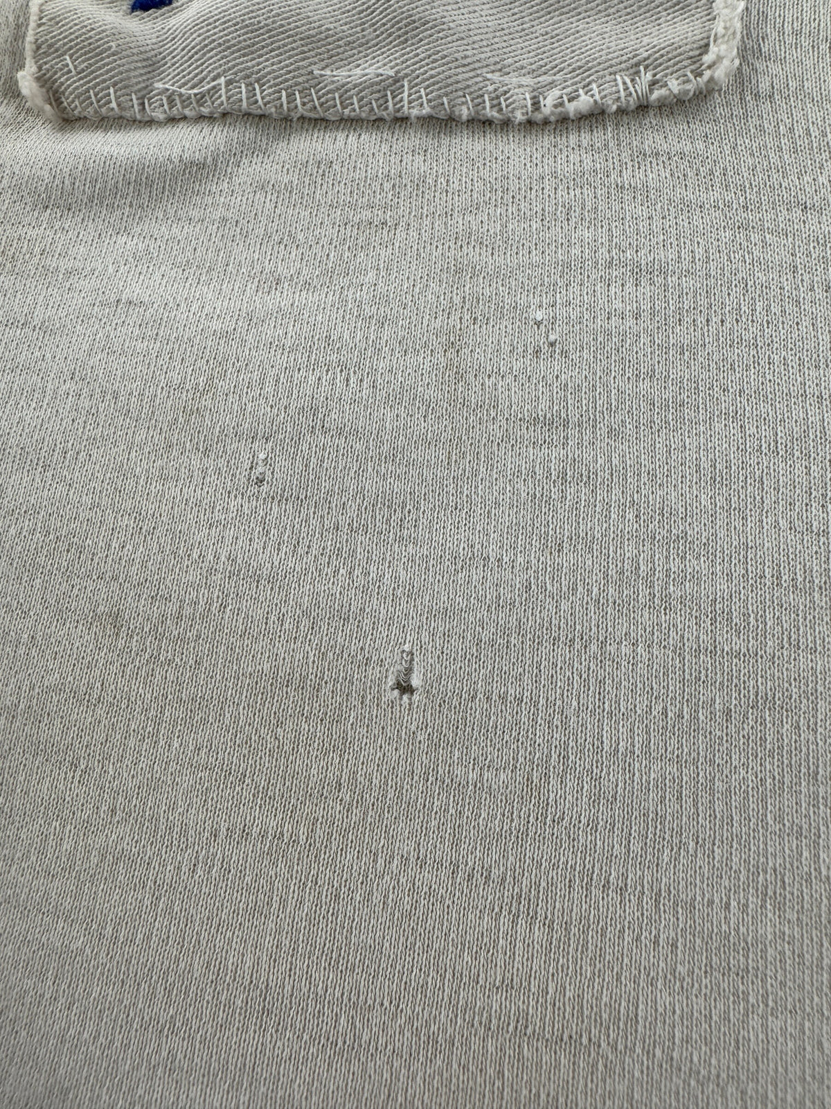 Small holes under patch on Vintage 40s Distressed Rowing Tank Top SZ M