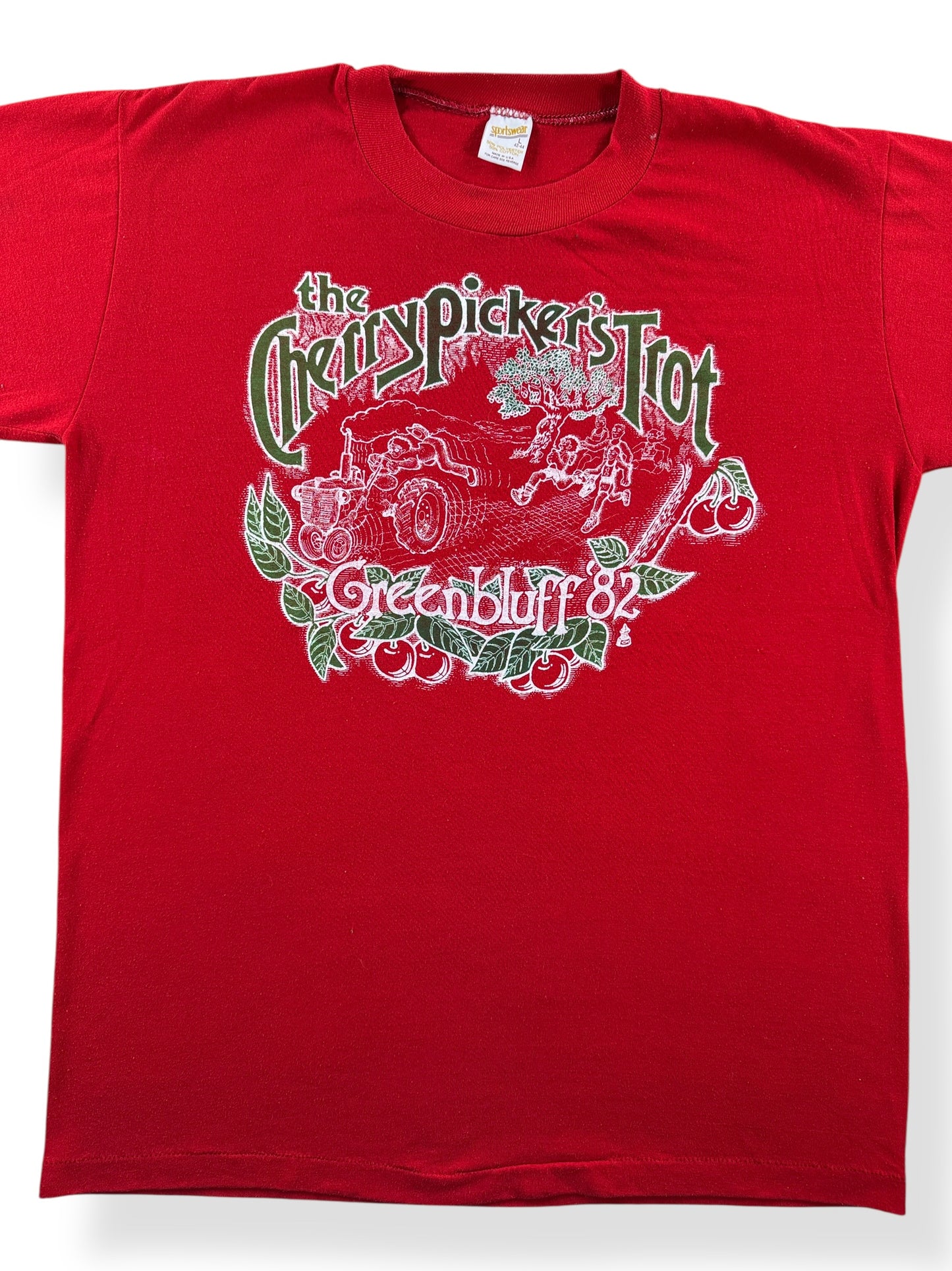 Front Close Up of Vintage Cherry Picker's Trot Tee SZ L (Fits M)