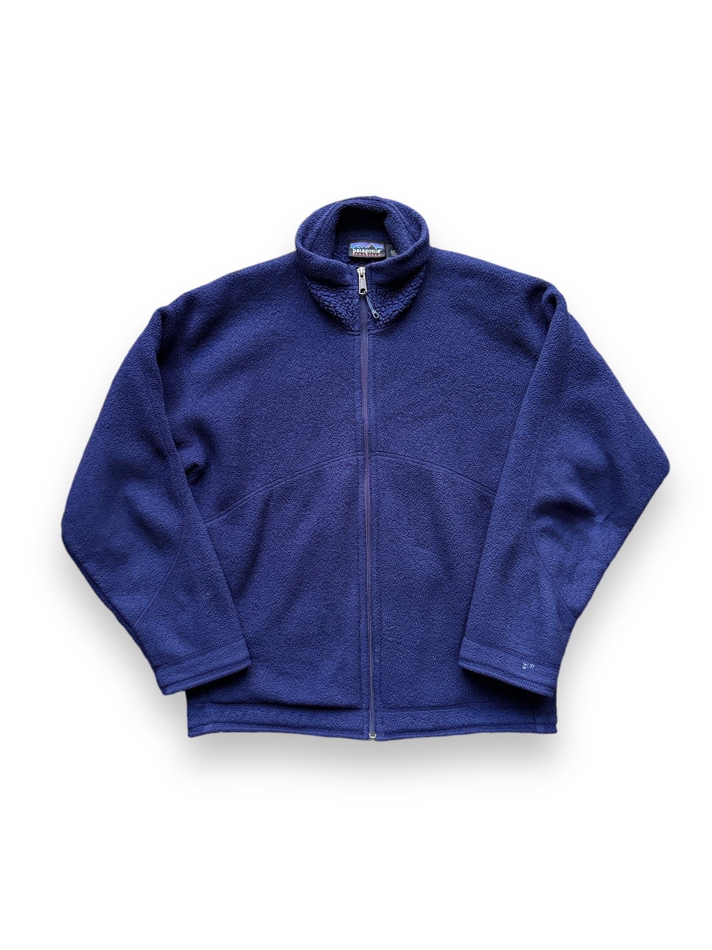 front of Vintage Patagonia Navy Synchilla Fleece SZ S