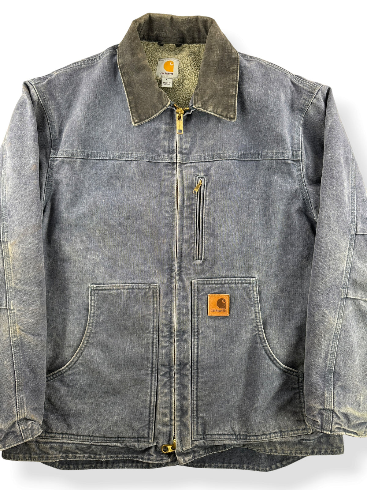 Close-up of Vintage Faded Blue Carhartt Arctic Jacket SZ L