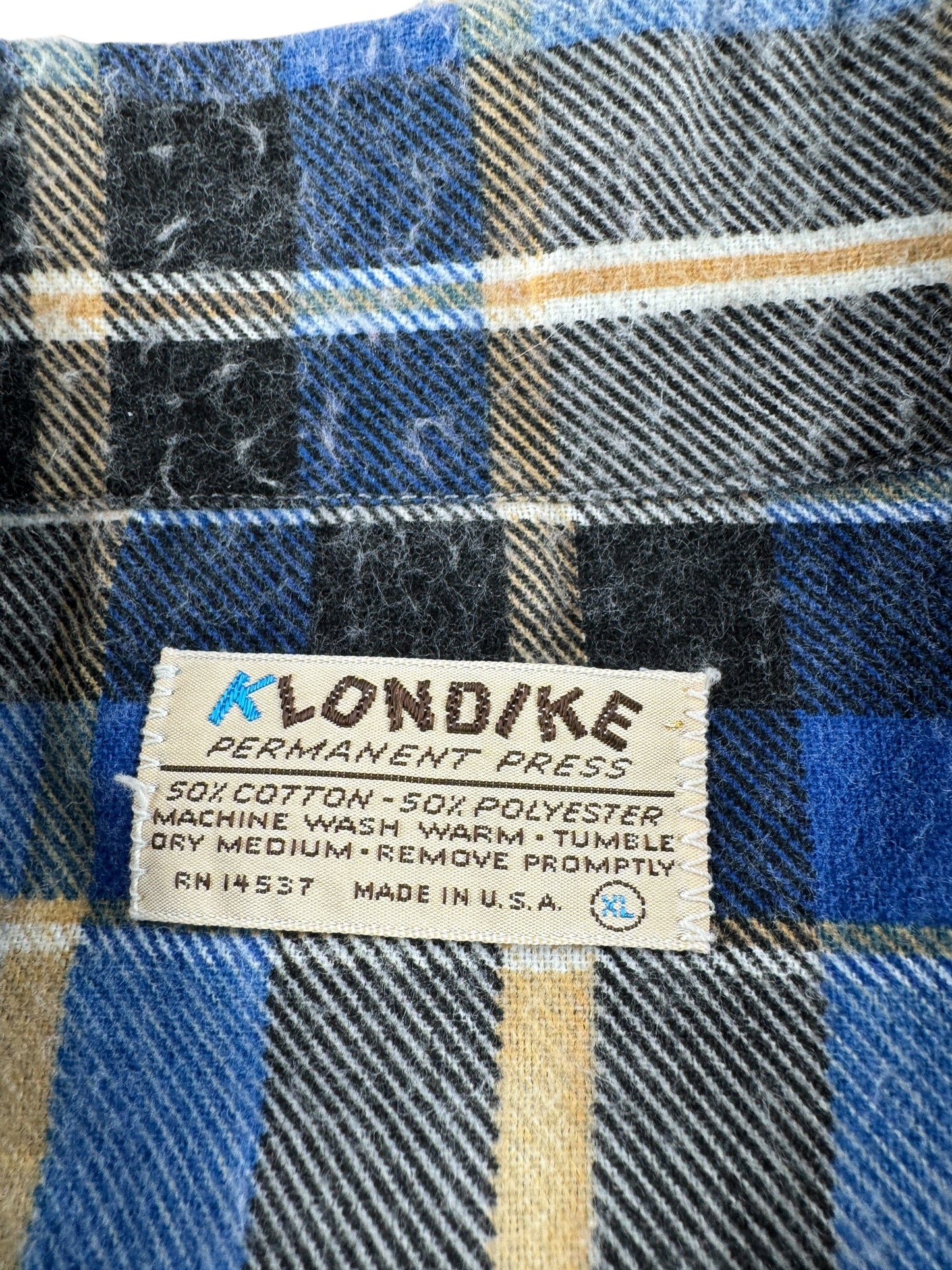 Label on Vintage Klondike Blue & Brown Flannel SZ XL