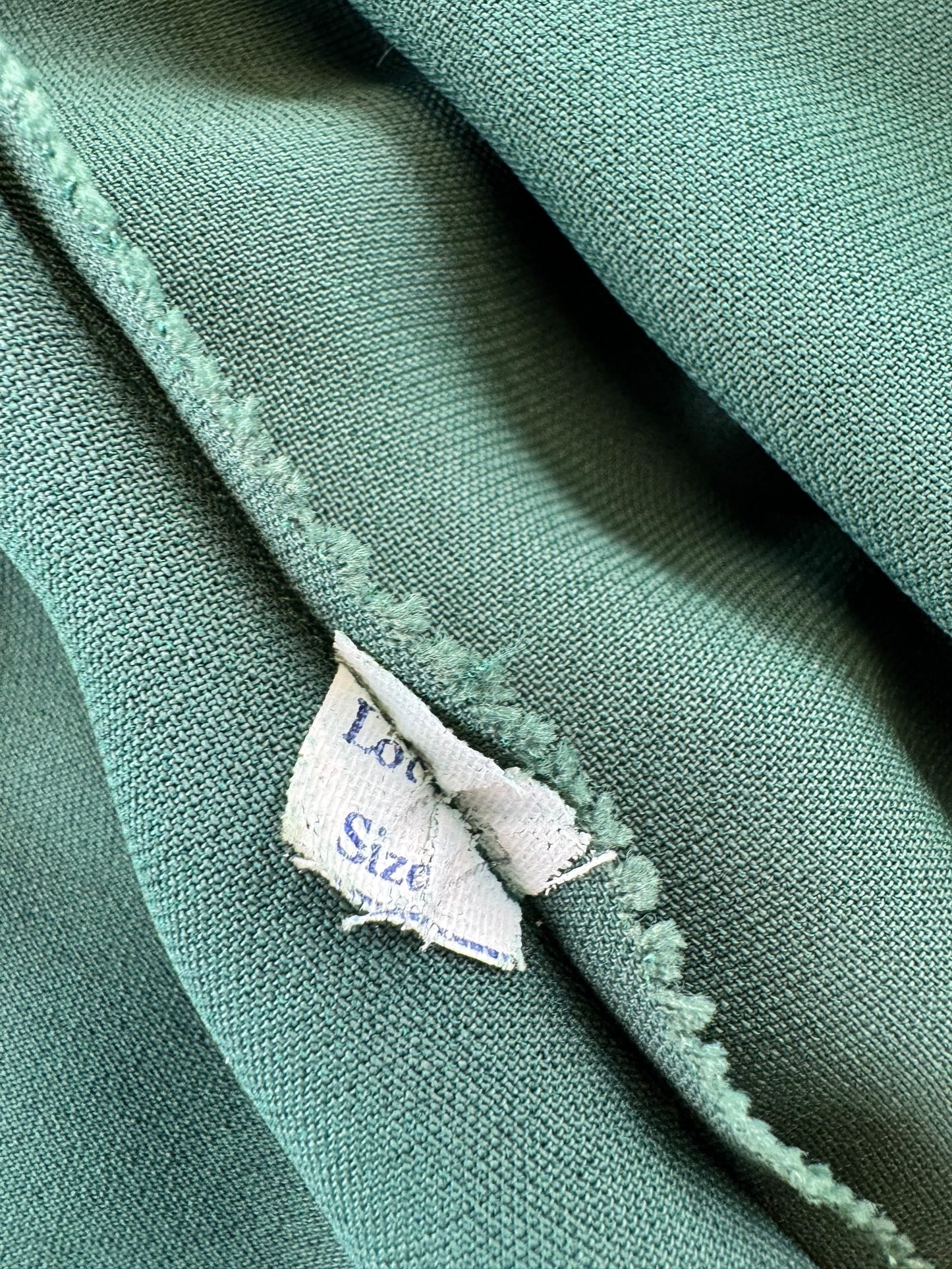 Size tag of 1940s Green Rayon Pleated Dress M