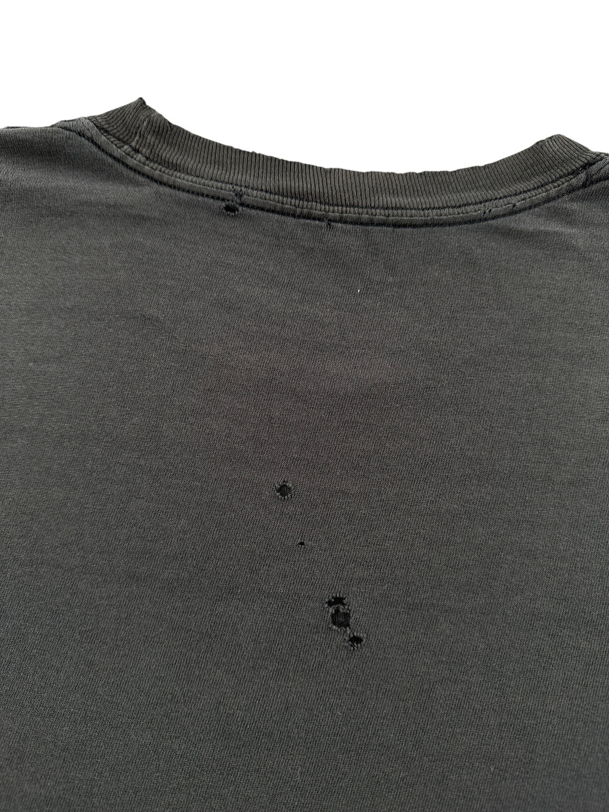 Small holes on back of Vintage Black Blank Pocket Tee SZ L