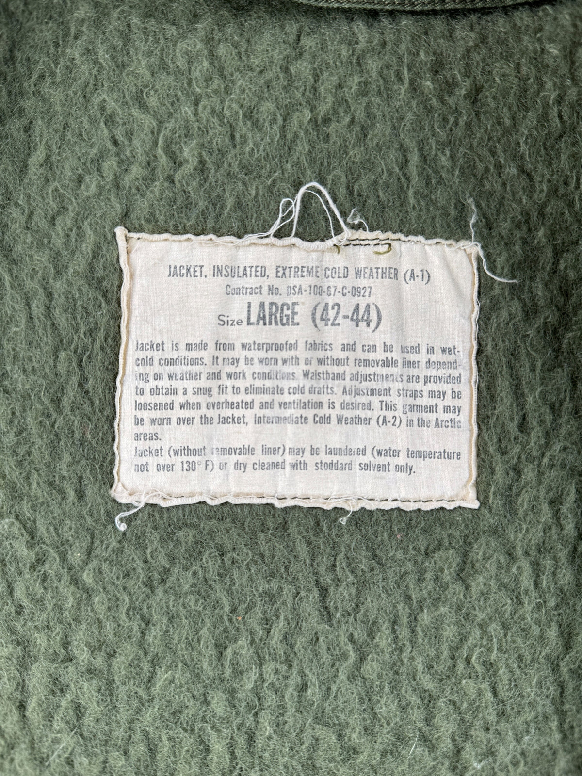 Label on Vintage 70’s US Navy Extreme Cold Weather Jacket SZ L