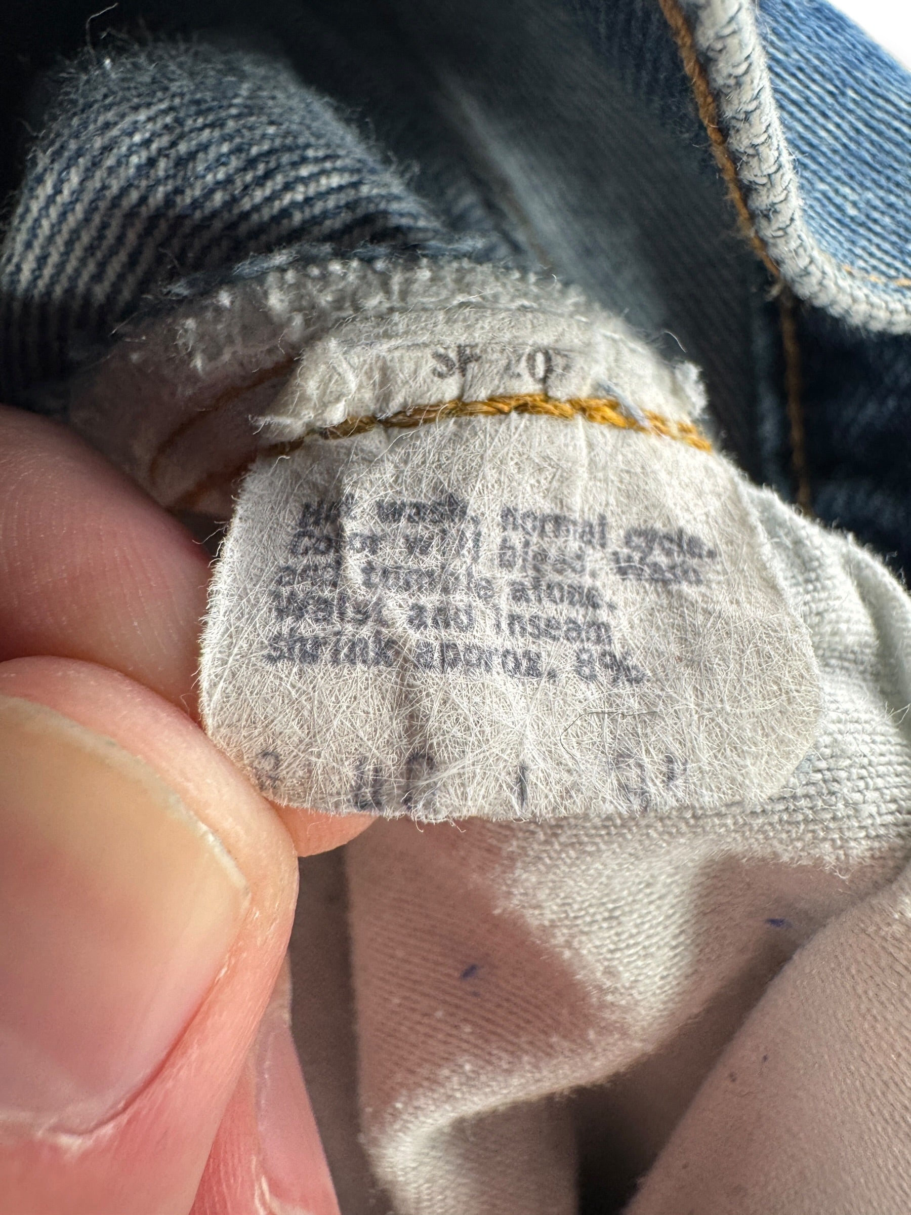 Tag on Vintage Double Stitch 80s Levis 501 Redline Jeans W38