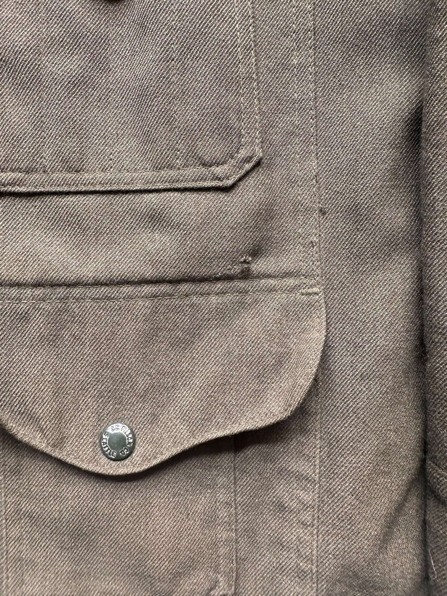 small hole on front left breast pocket on Vintage Filson Forestry Cloth Cruiser SZ 40