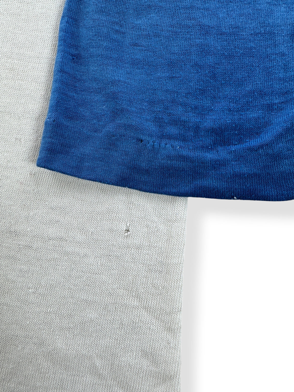 Small hole on front of Vintage Bellingham Rock Raglan Tee SZ L (Fits M)