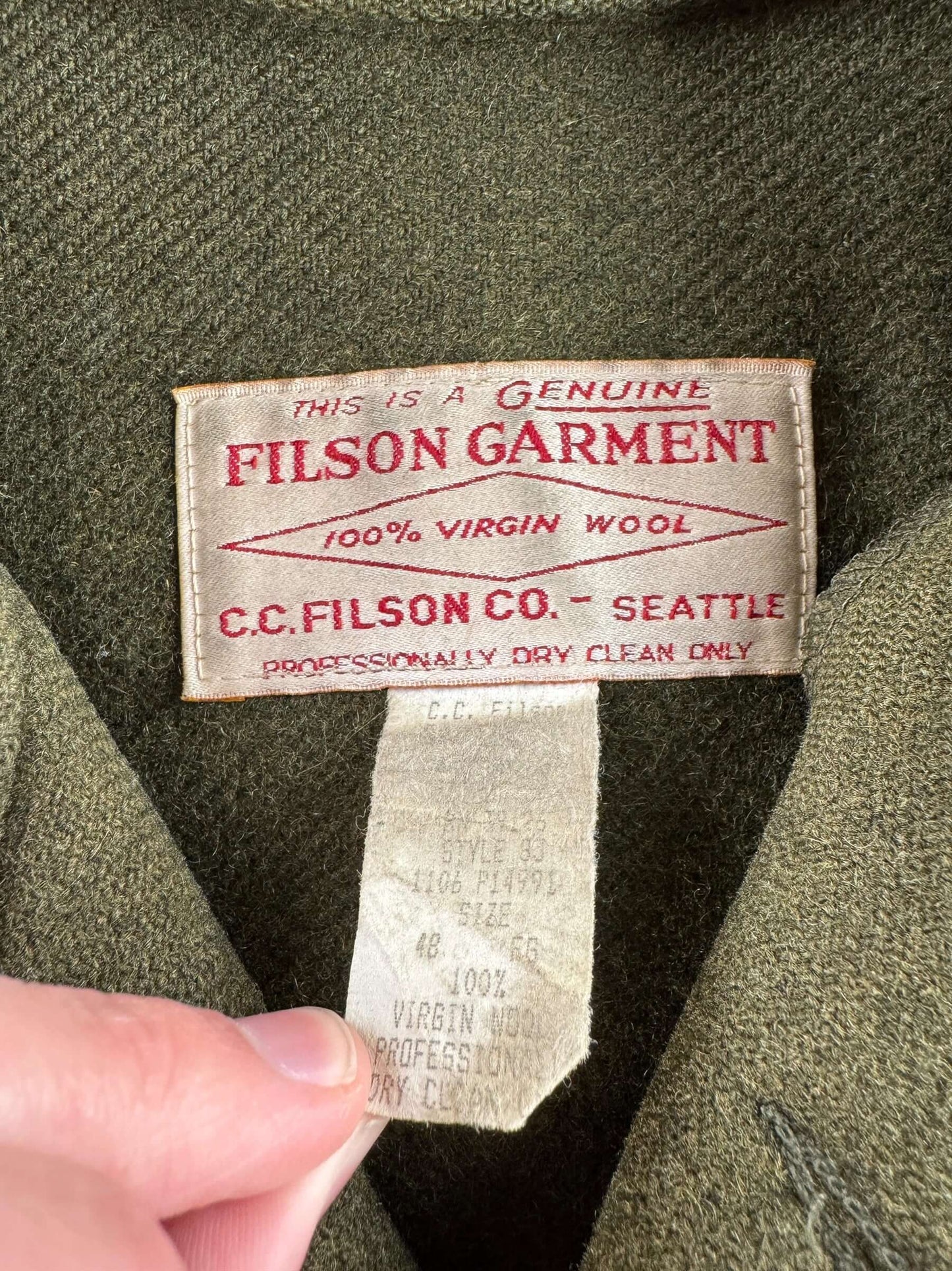 Tag on Vintage 90s Era Filson Olive Green Double Mackinaw Jacket SZ 48