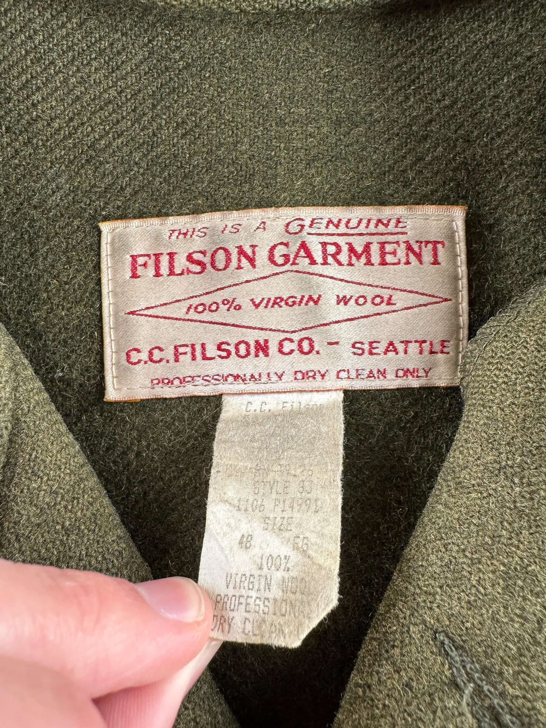 Tag on Vintage 90s Era Filson Olive Green Double Mackinaw Jacket SZ 48