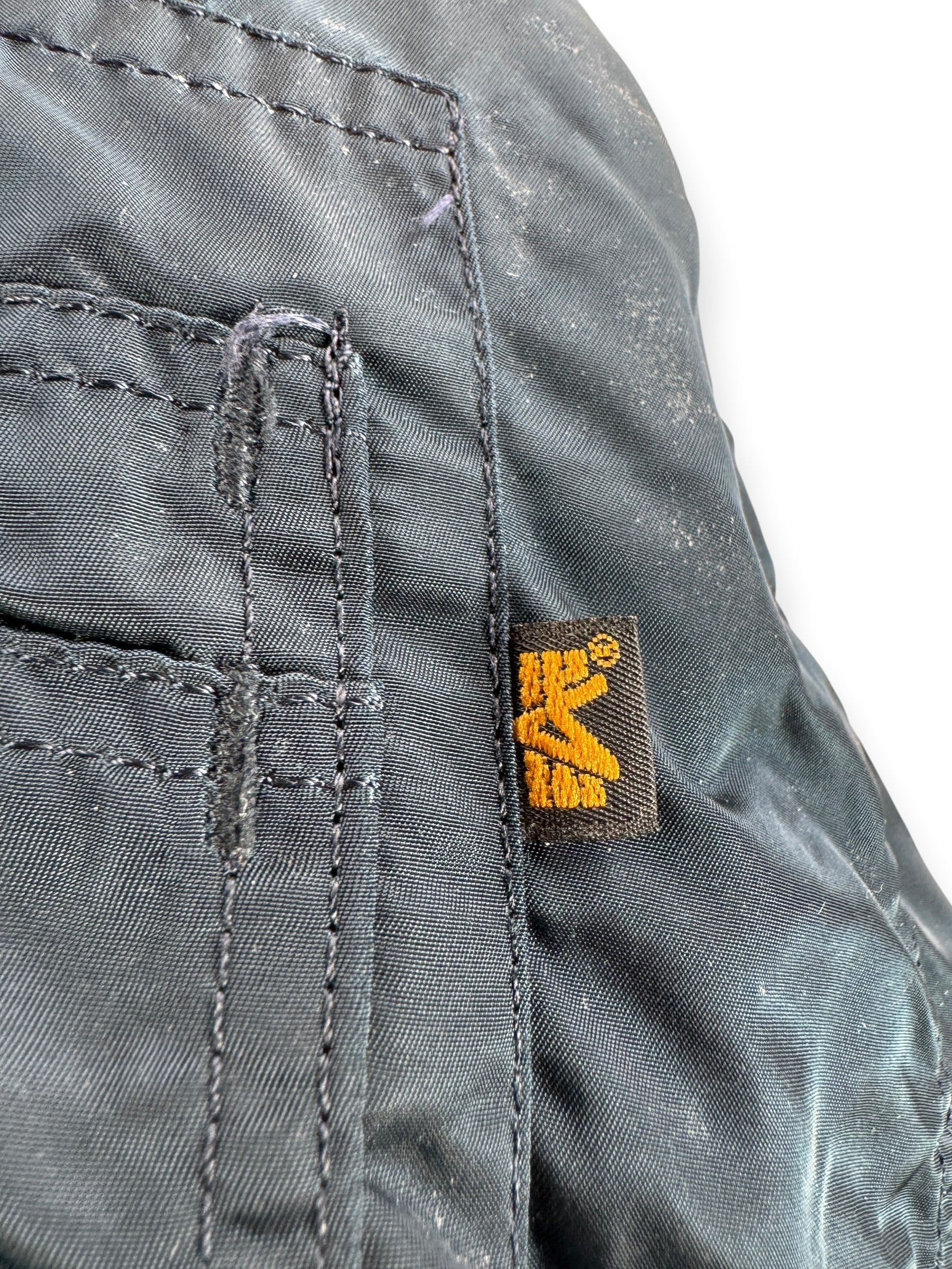 Label on Vintage Navy Blue Alpha Industries Bomber Jacket SZ L