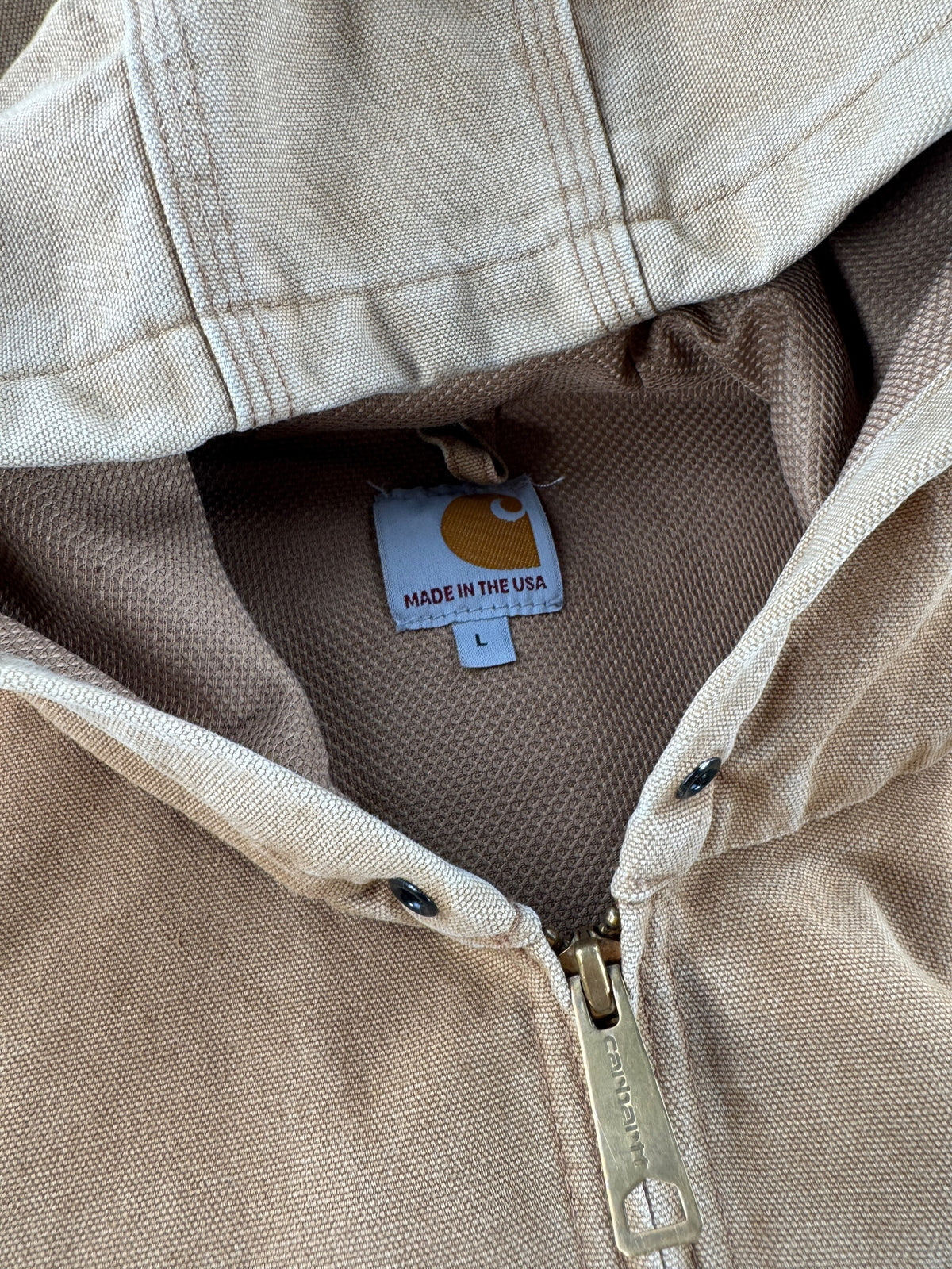 Hood, tag and zipper on Carhartt Tan Hooded Jacket SZ L