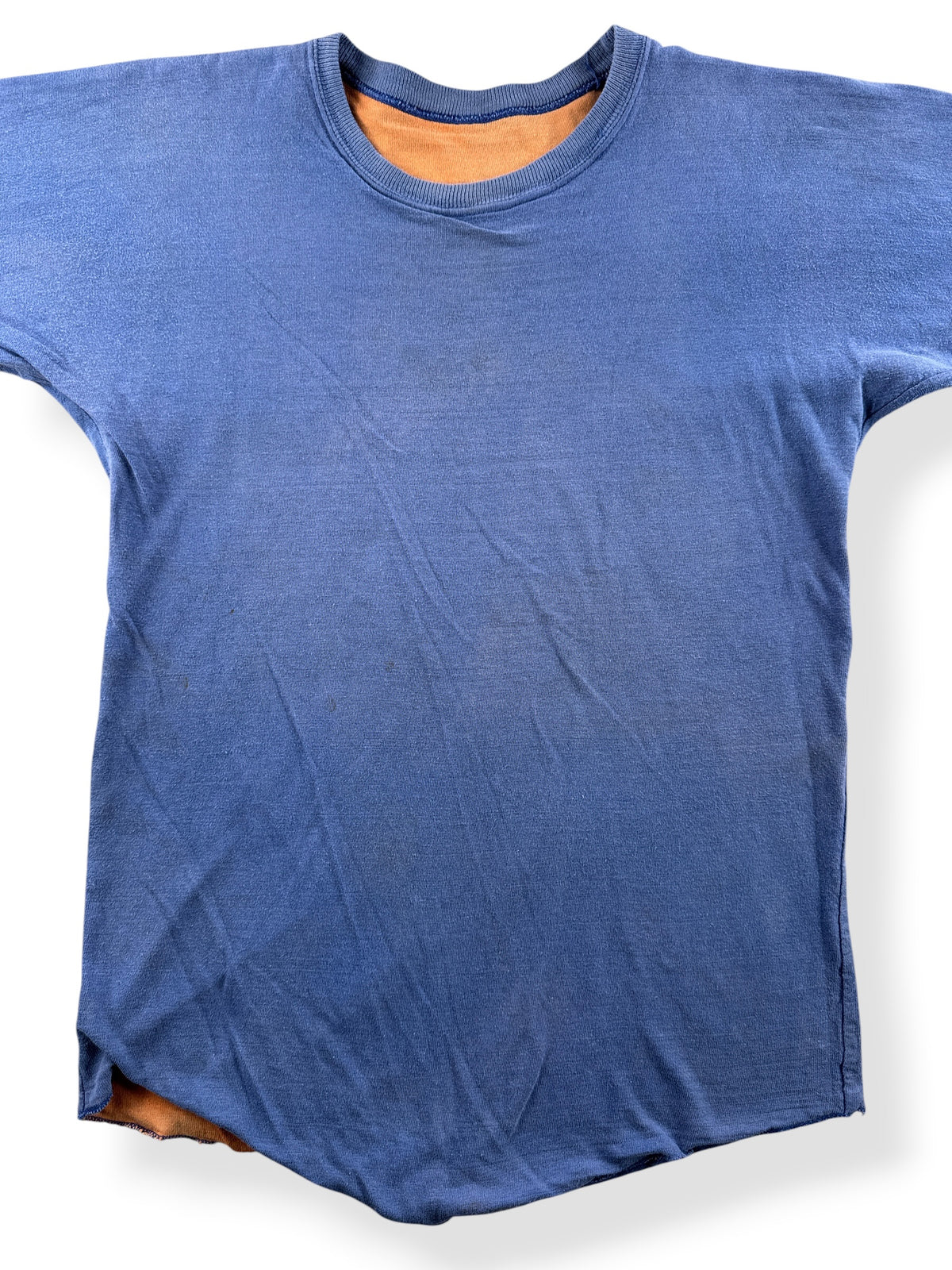 Close-up of inside-out Vintage Orange / Blue Reversible Tee SZ M