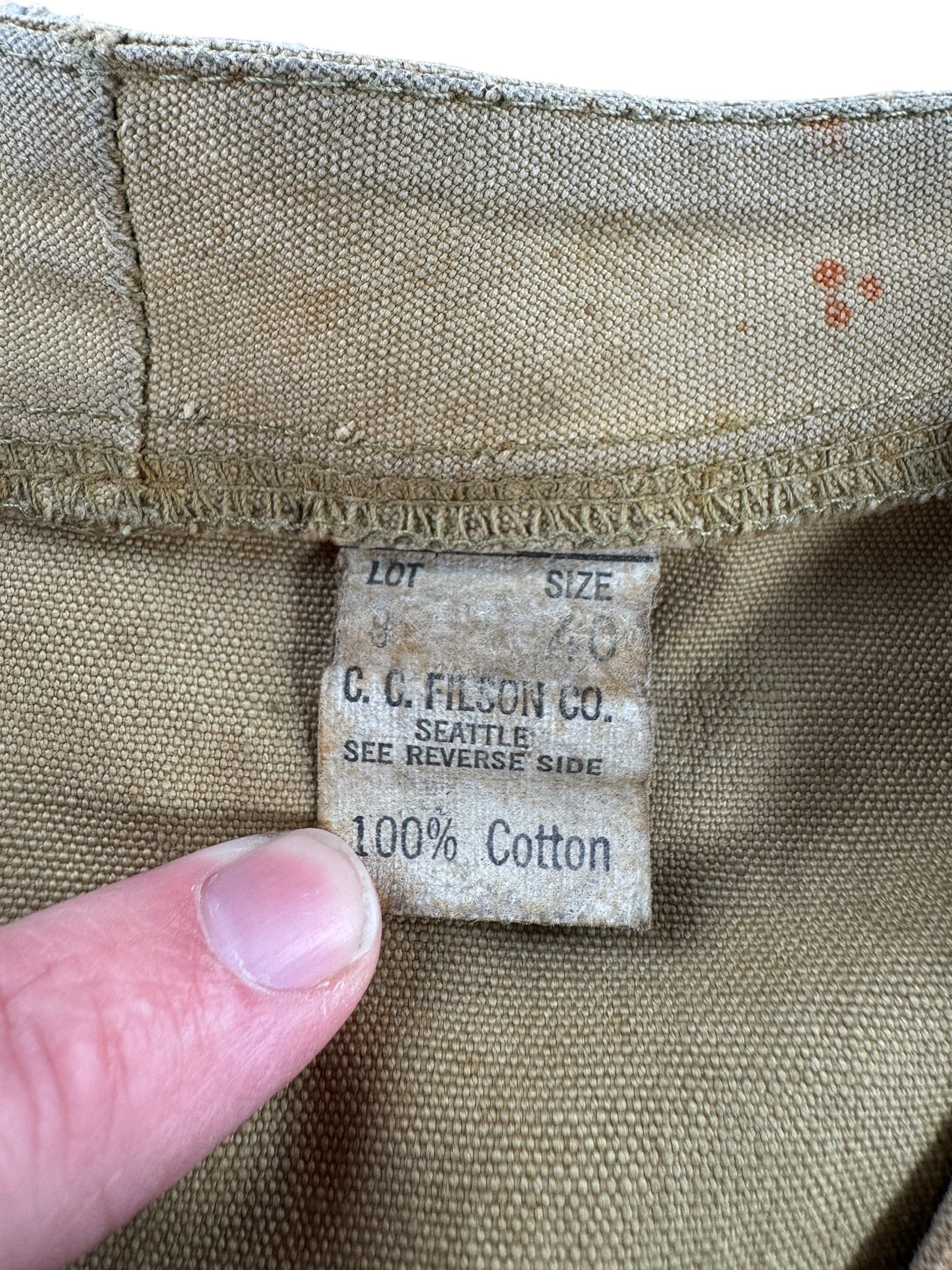 Tag on Vintage Filson Tin Hunting Vest Button Sample SZ 40