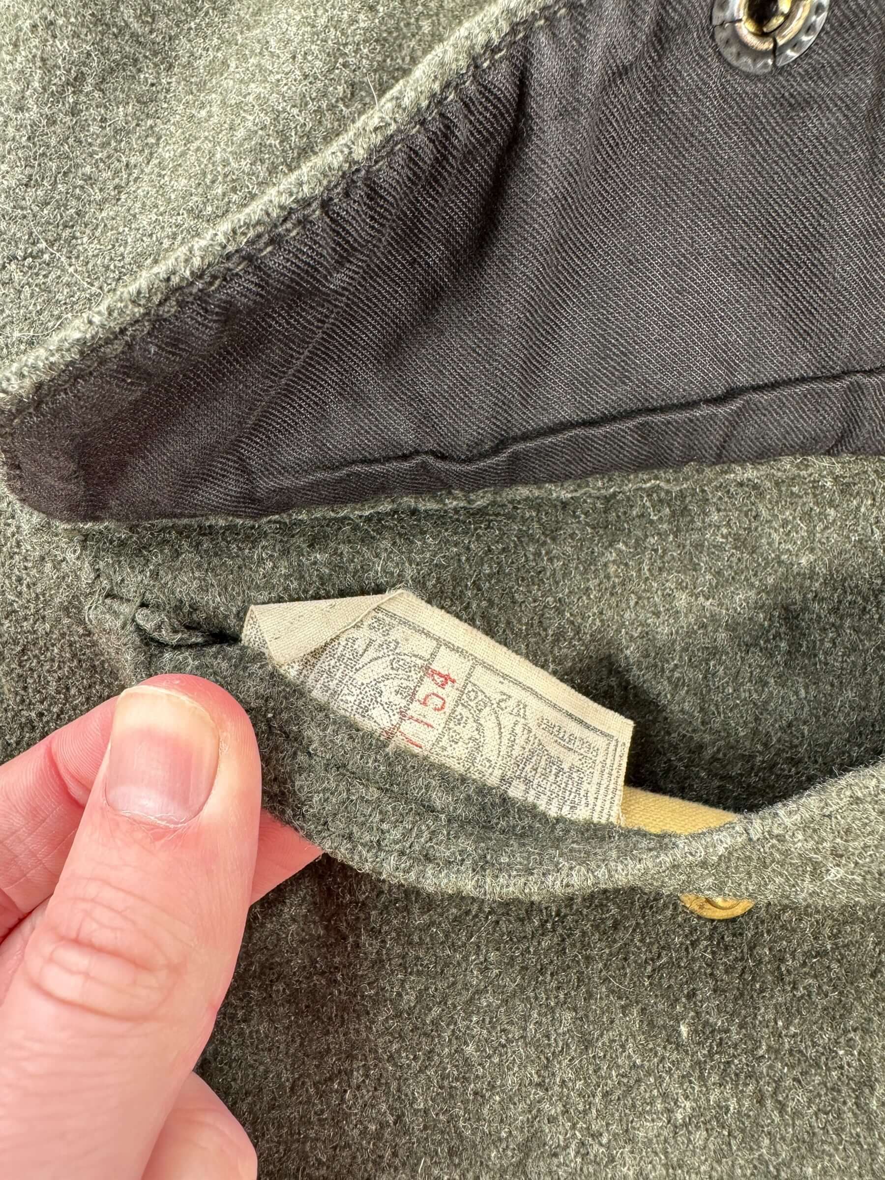 Union Tag on Vintage Union Made Filson Mackinaw Green Cruiser SZ 48