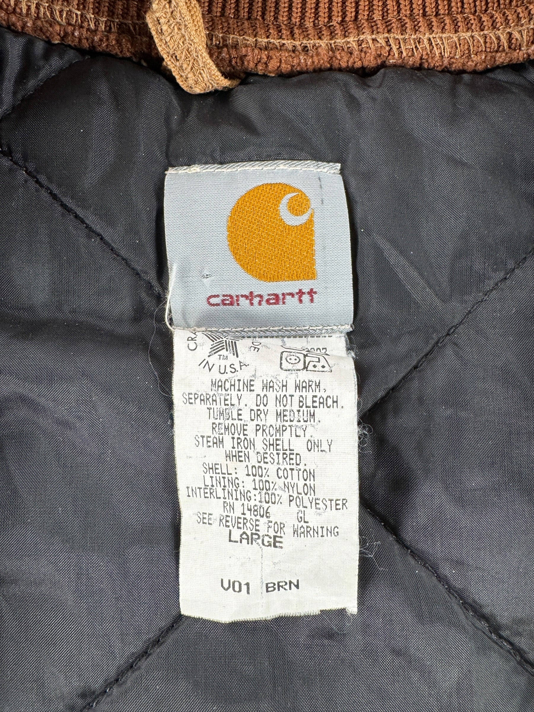 Tag on Vintage Carhartt Quilted Vest SZ L